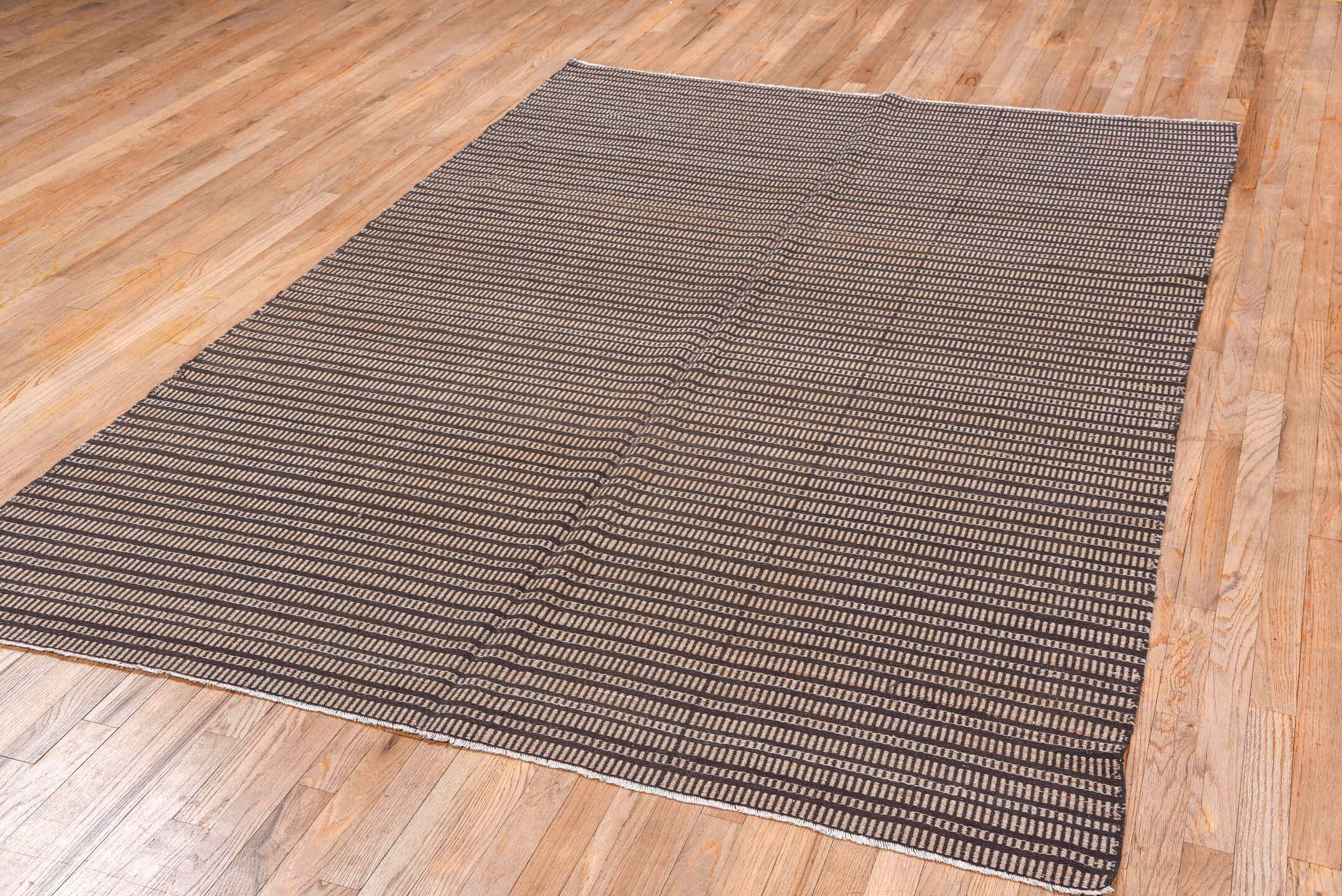 6' x 8' one-of-a-kind handmade vintage Jijim medium size rug. Color palette: brown, camel, ivory, taupe, beige, gray