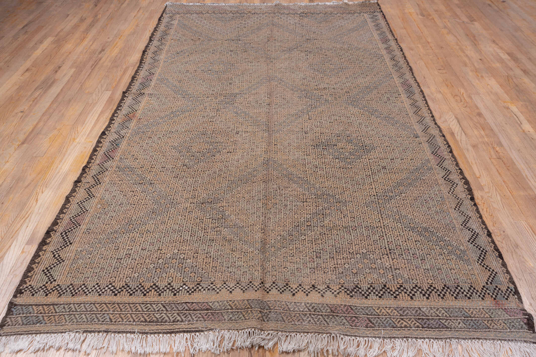 6' x 10' one-of-a-kind handmade vintage Jijim large size rug. Color palette: black, brown, gray, light gray, off-white, pink