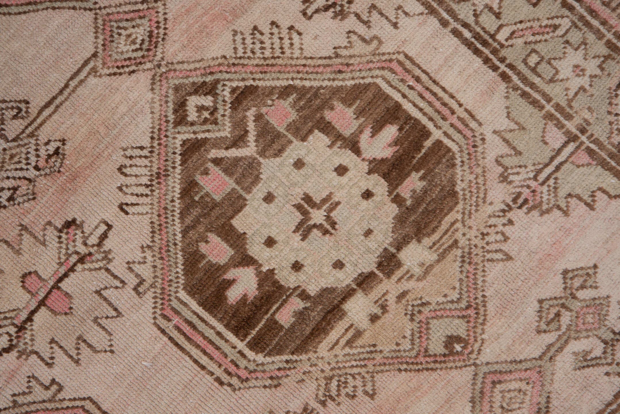 4' x 9' one-of-a-kind handmade antique Trans Caucasian runner rug. Color palette: ivory, taupe, brown, dusty_rose, camel