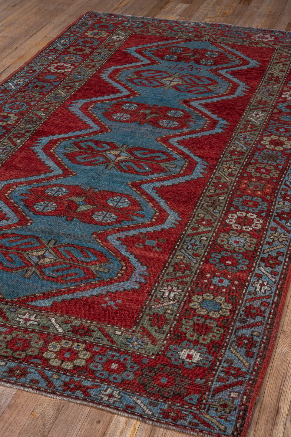 4' x 7' one-of-a-kind handmade vintage Trans Caucasian rug. Color palette: blue, brown, dim gray, gray, pink