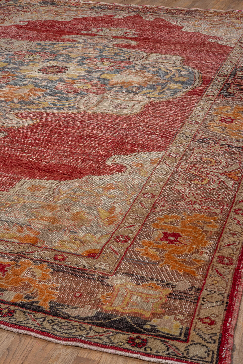 9' x 14' one-of-a-kind handmade vintage Oushak large size rug. Color palette: brown, gray, pink, red