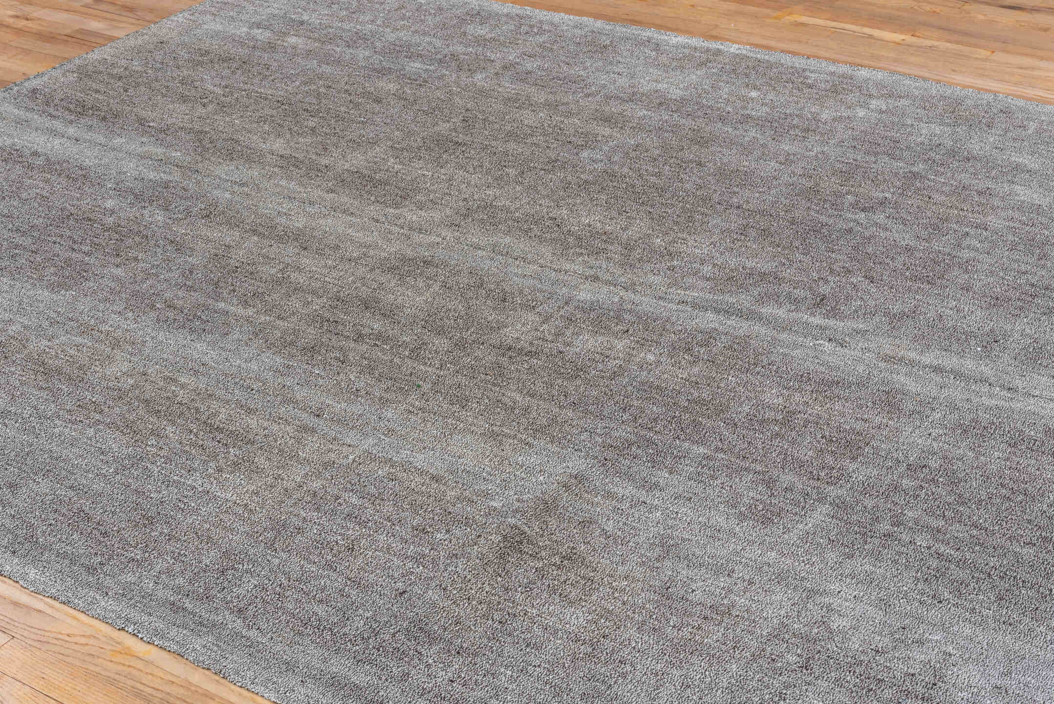 7' x 9' one-of-a-kind handmade antique Flatweave rug. Color palette: gray, charcoal, taupe, black, beige