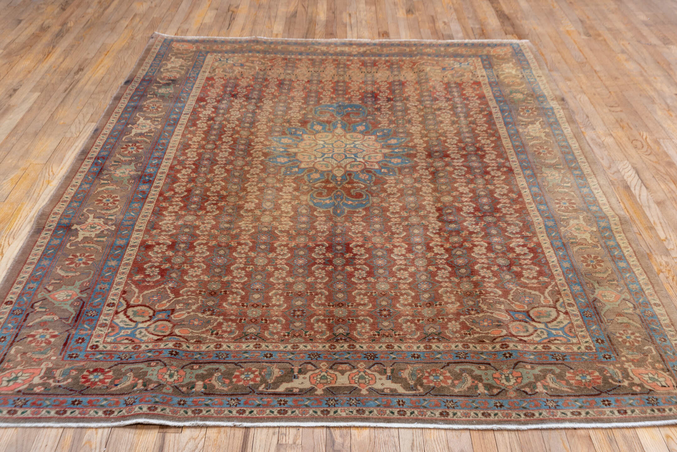 6' x 9' one-of-a-kind handmade vintage Bidjar medium size rug. Color palette: rust, taupe, slate blue, camel, ivory, brown