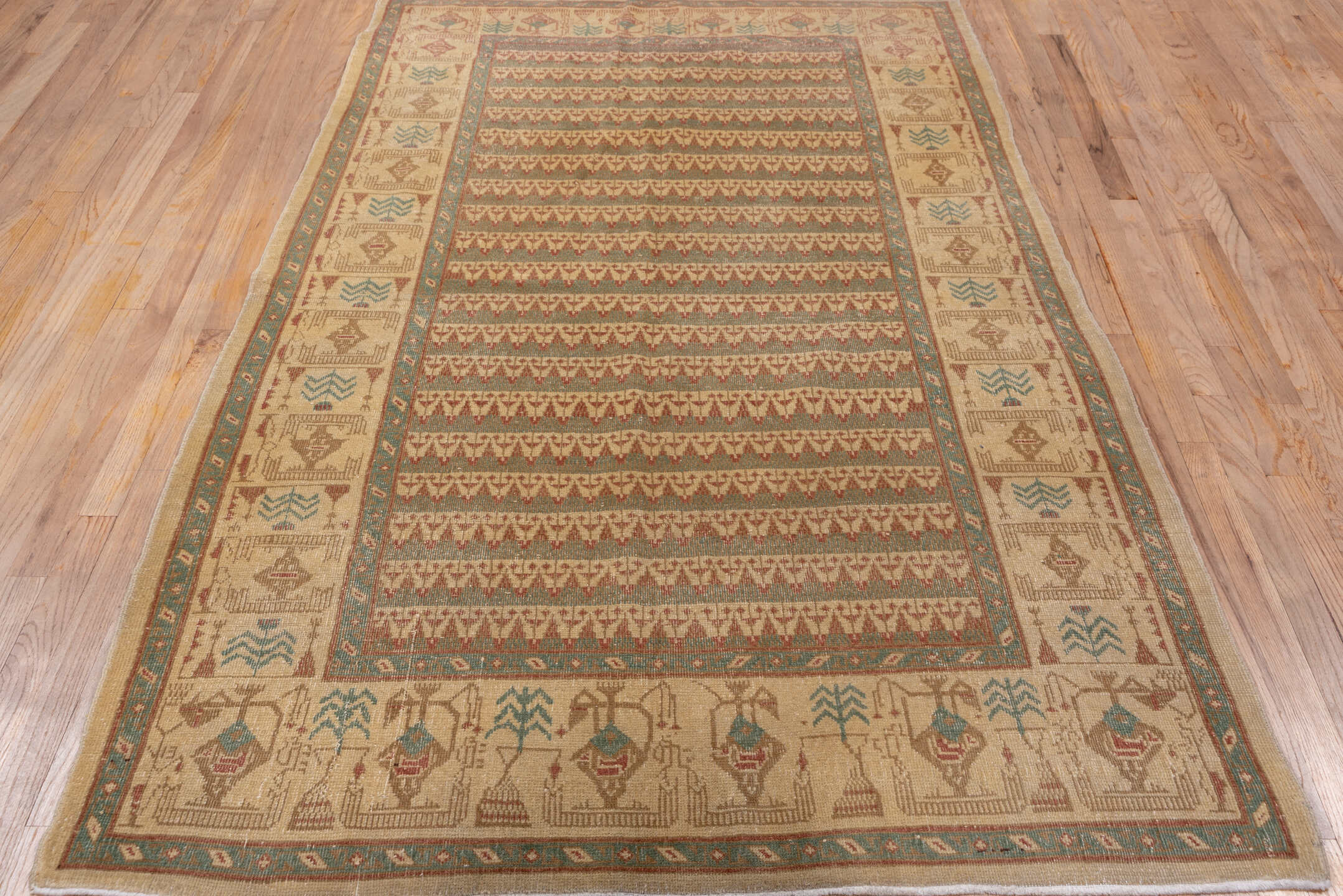5' x 7' one-of-a-kind handmade vintage Oushak rug. Color palette: ivory, taupe, rust, teal, camel, sage, brown, beige, gray