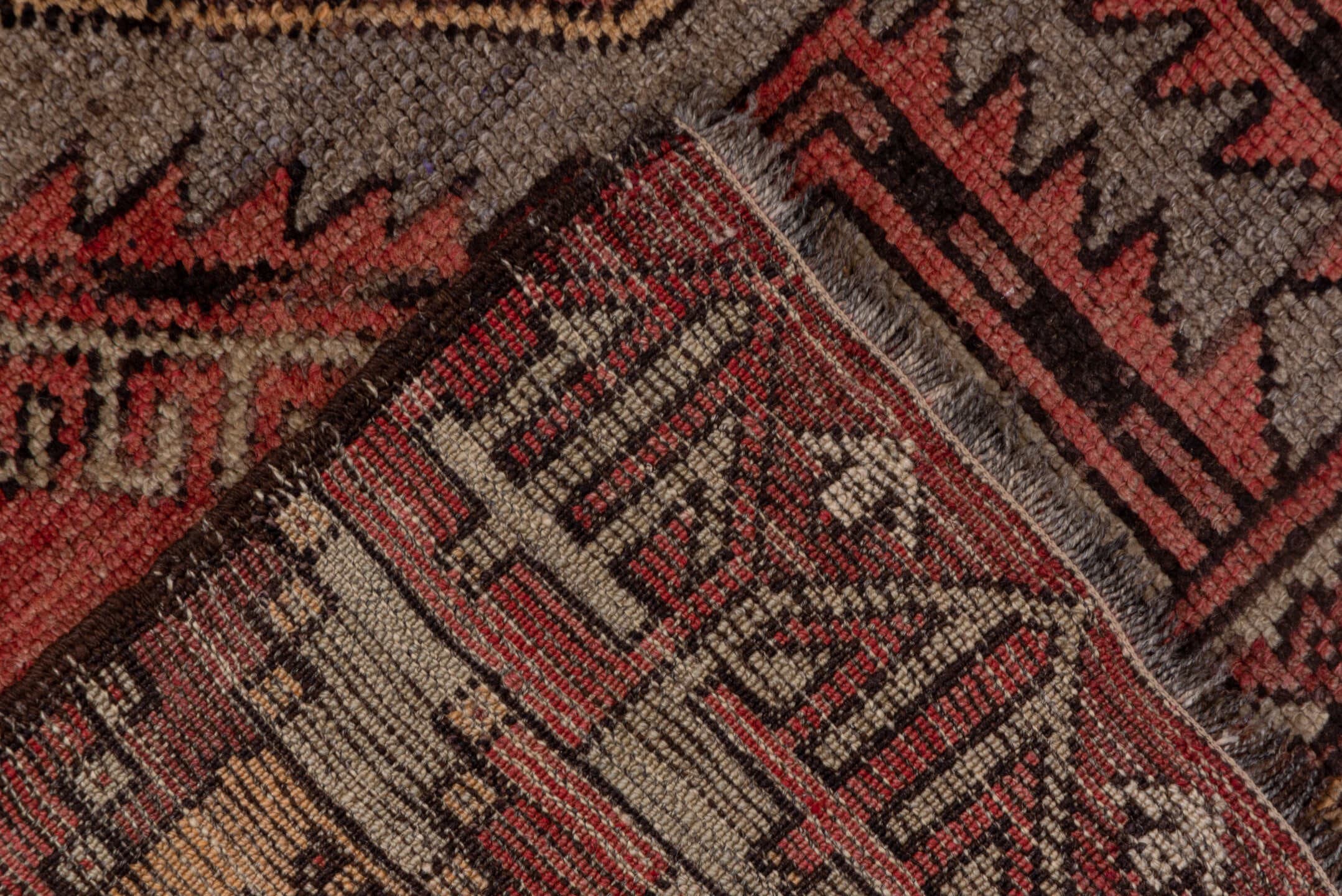 4' x 10' one-of-a-kind handmade vintage Oushak runner rug. Color palette: terra cotta, ivory, charcoal, rose, taupe