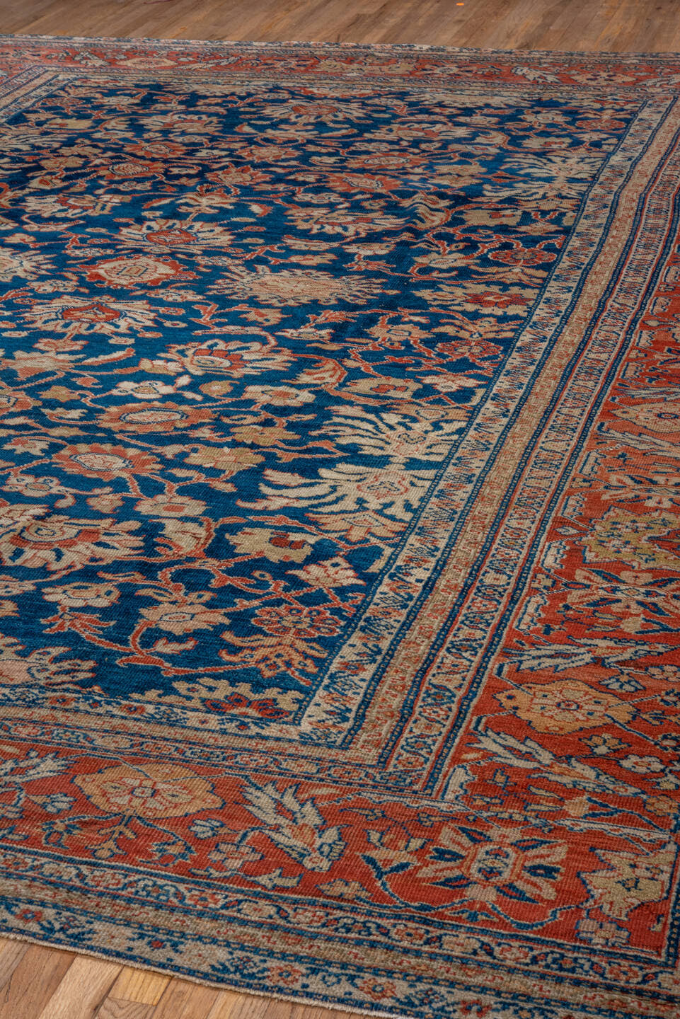 10' x 12' one-of-a-kind handmade antique Sultanabad large size rug. Color palette: navy, rust, ivory, camel, indigo