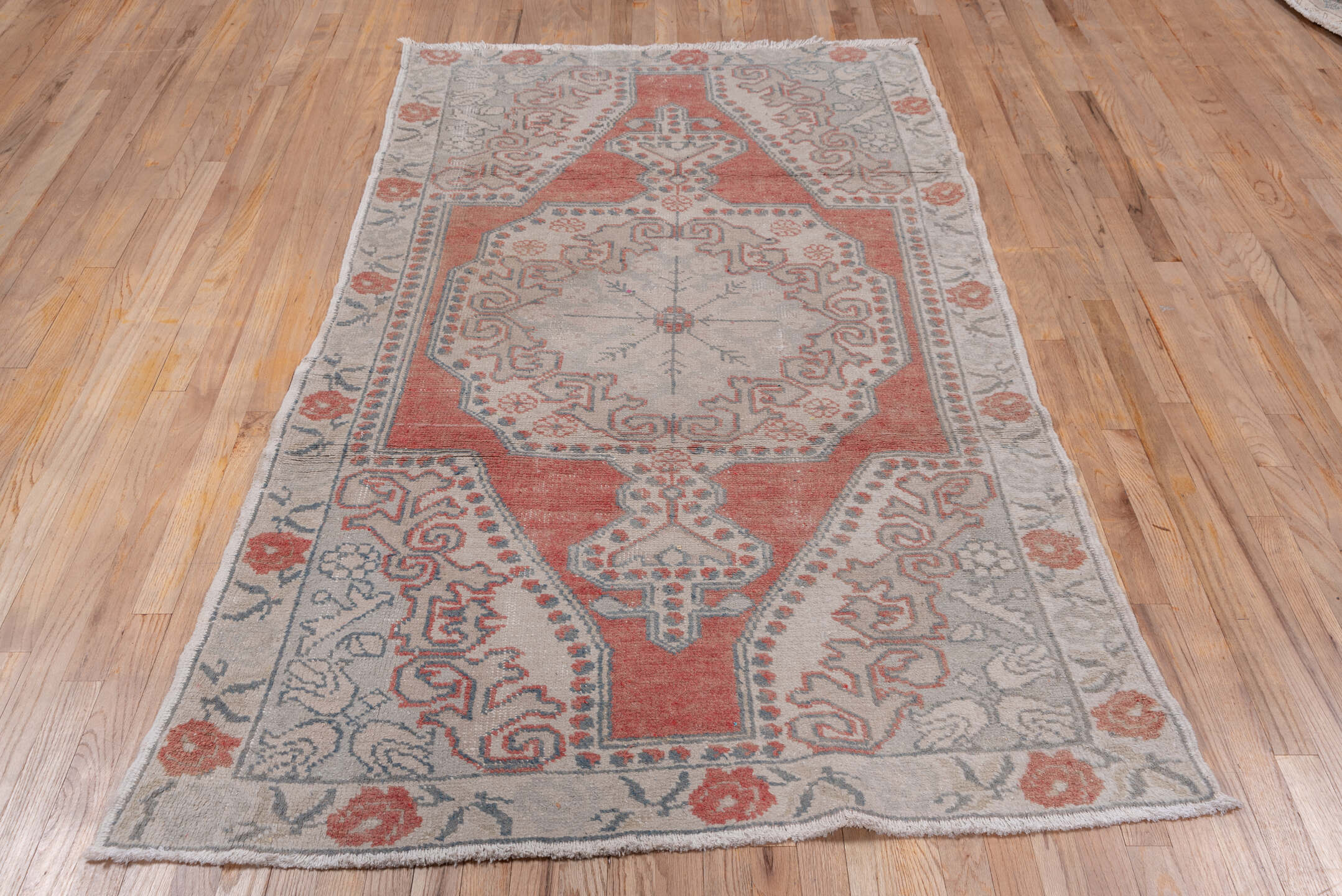 4' x 7' one-of-a-kind handmade vintage Oushak rug. Color palette: ivory, coral, blue_gray, taupe, sage, terracotta, gray