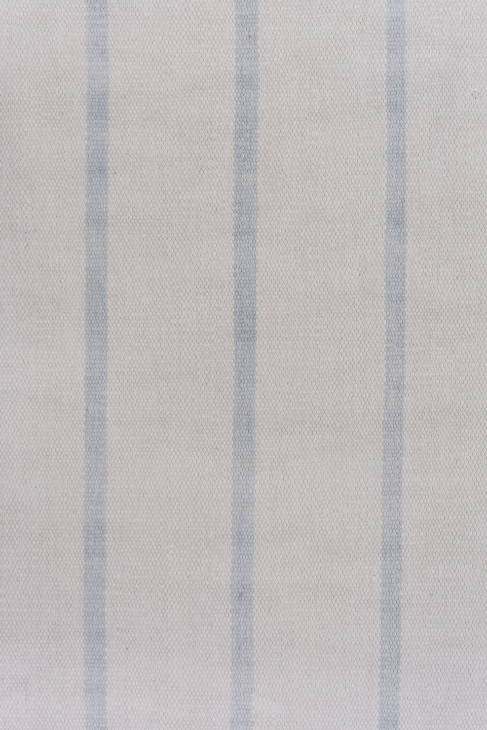 9' x 17' one-of-a-kind handmade antique Dhurrie rug. Color palette: pale blue, ivory, sky blue, light blue