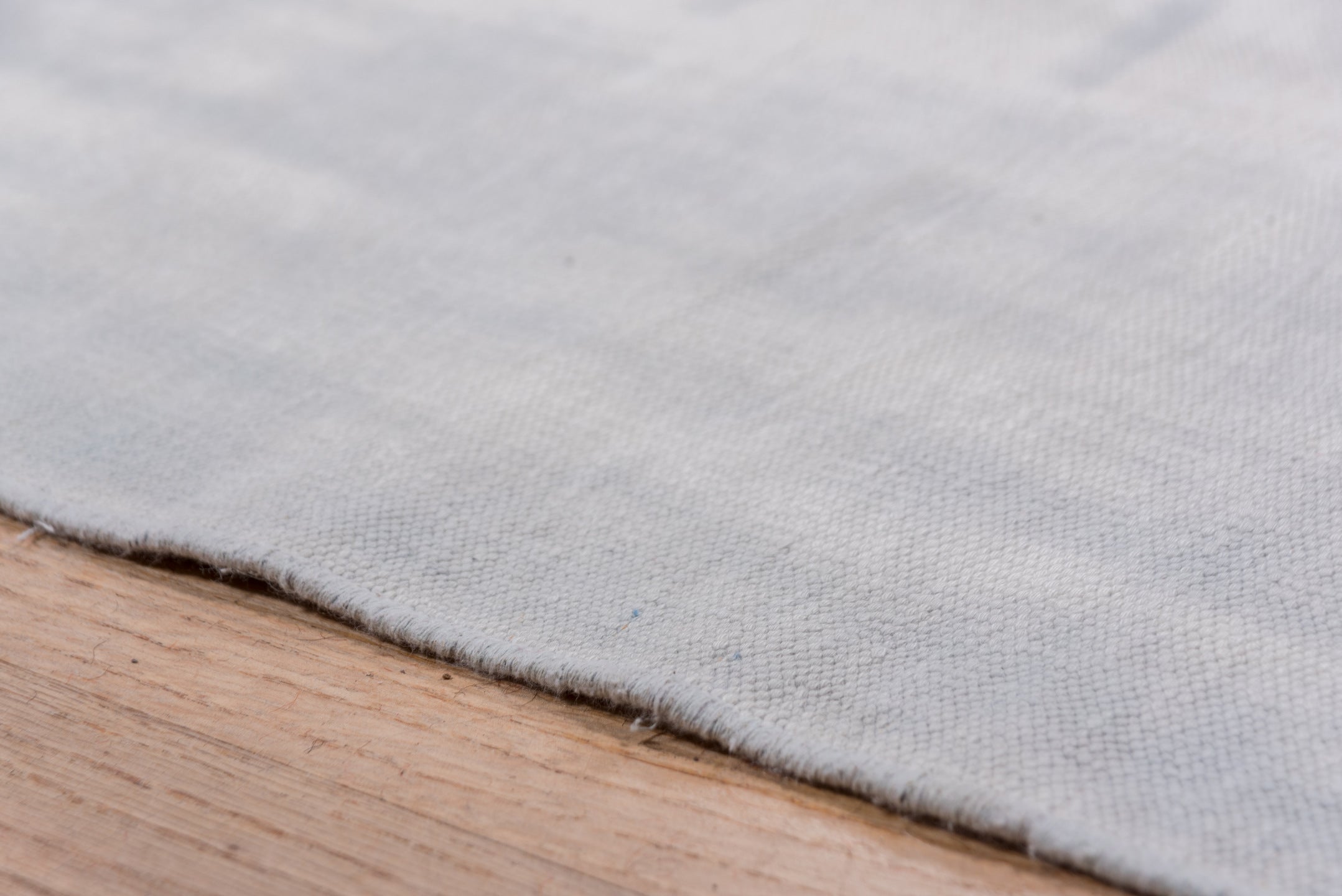 9' x 17' one-of-a-kind handmade antique Dhurrie rug. Color palette: pale blue, ivory, sky blue, light blue