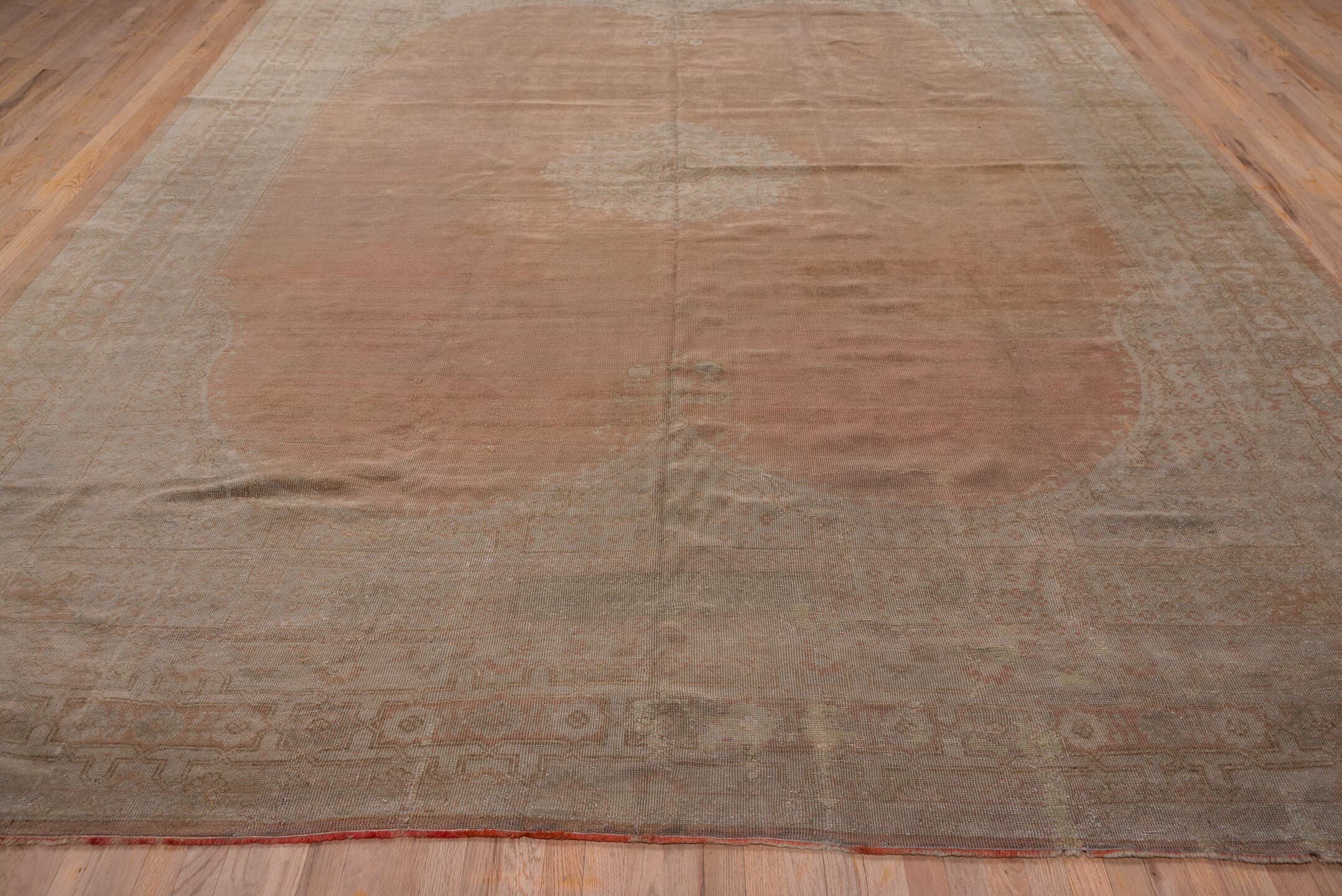 11' x 13' one-of-a-kind handmade antique Oushak oversize rug. Color palette: blush, taupe, ivory, rose, beige, camel
