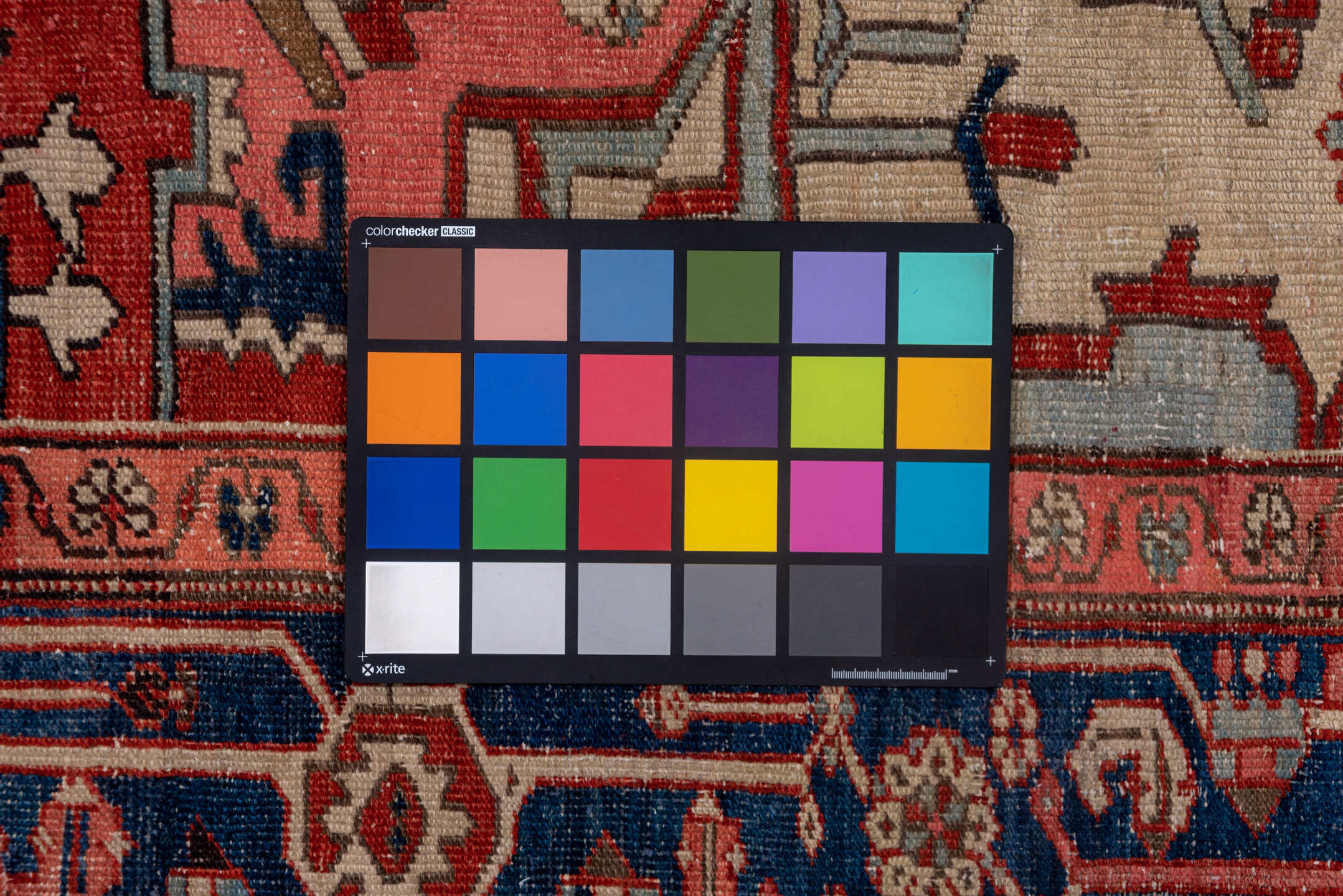 9' x 12' one-of-a-kind handmade vintage Serapi large size rug. Color palette: black, blue, brown, gray, pink, red