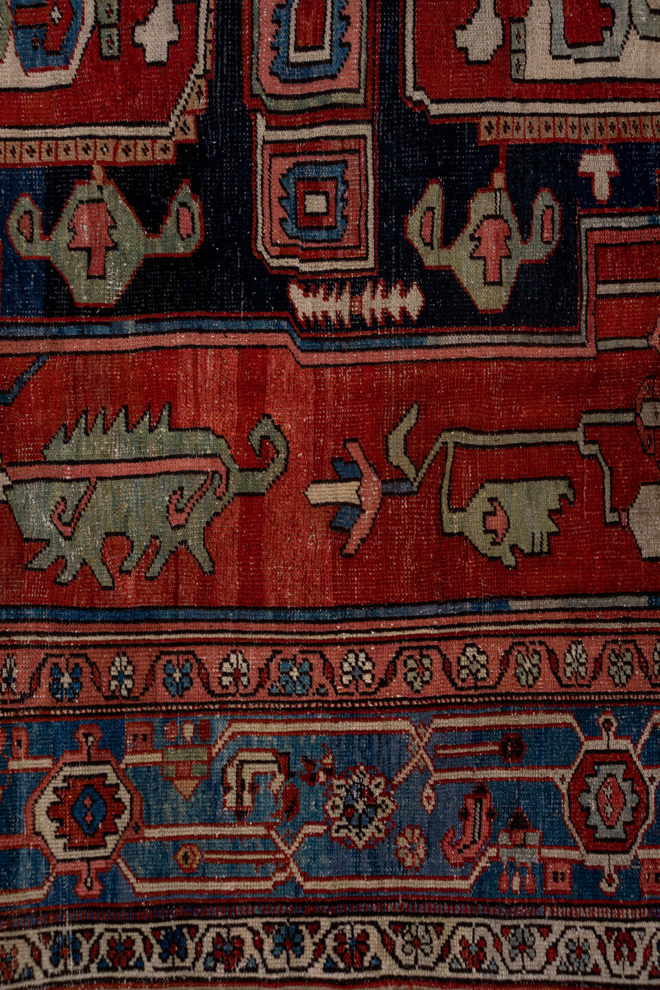 9' x 12' one-of-a-kind handmade vintage Serapi large size rug. Color palette: black, blue, brown, gray, pink, red