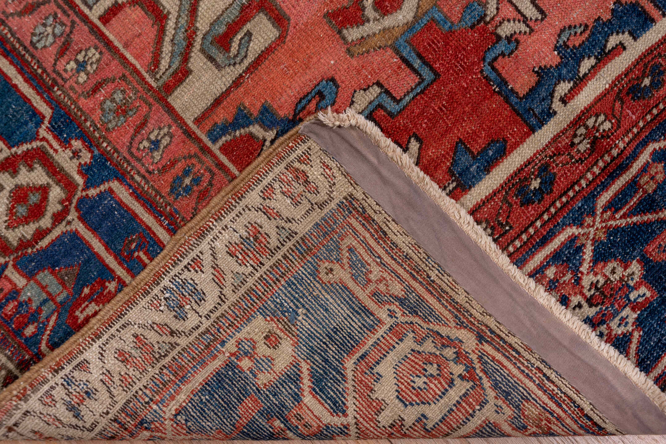 9' x 12' one-of-a-kind handmade vintage Serapi large size rug. Color palette: black, blue, brown, gray, pink, red