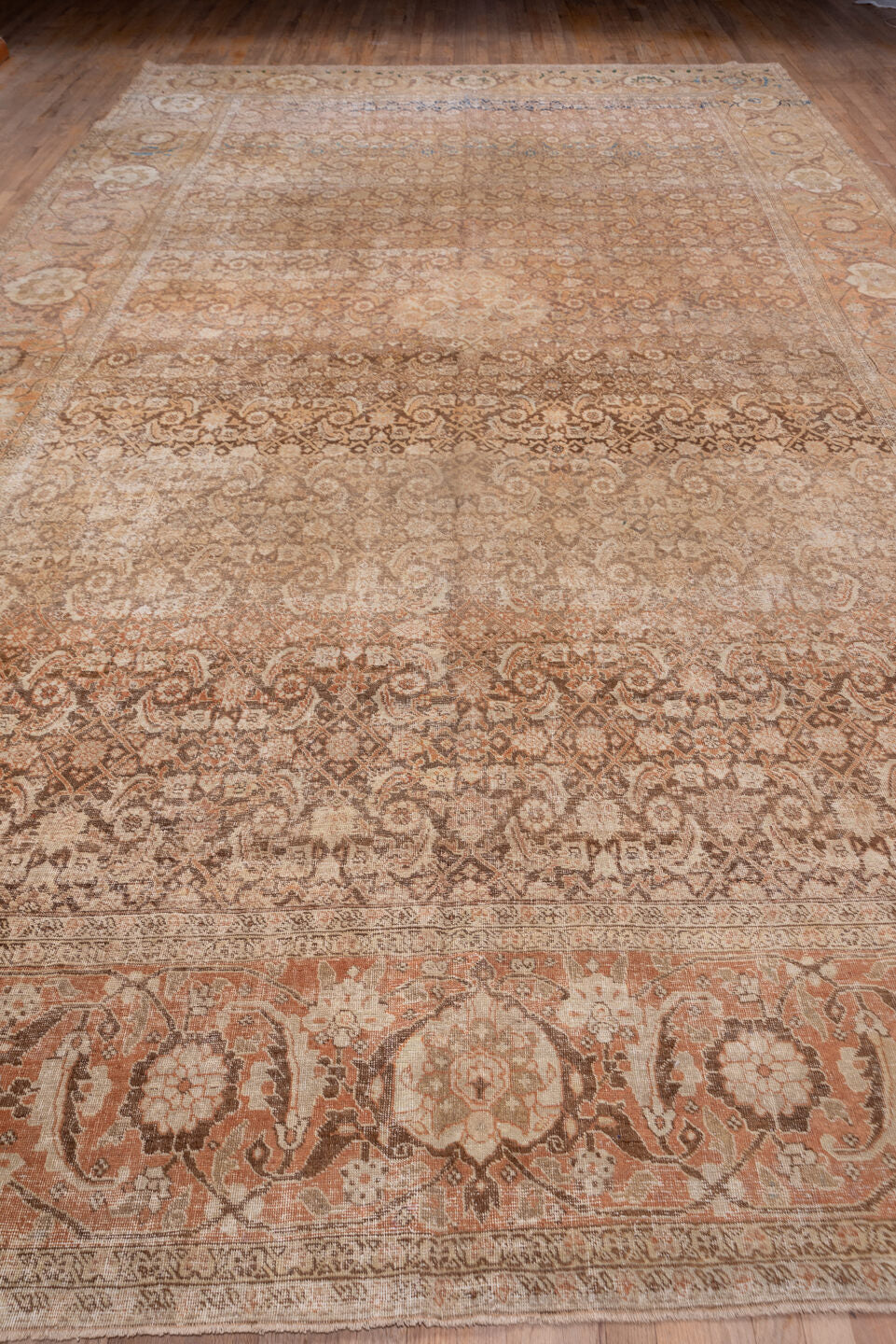 10' x 18' one-of-a-kind handmade antique Tabriz rug. Color palette: camel, taupe, ivory, tan, terra cotta, brown, pale blue