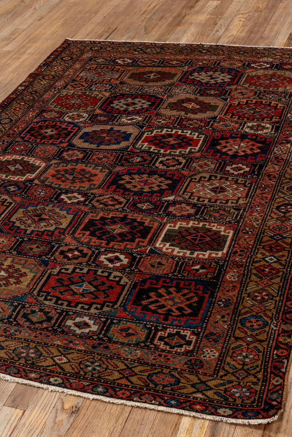 4' x 6' one-of-a-kind handmade antique Malayer small size rug. Color palette: camel, navy, rust, terracotta, ivory, brown