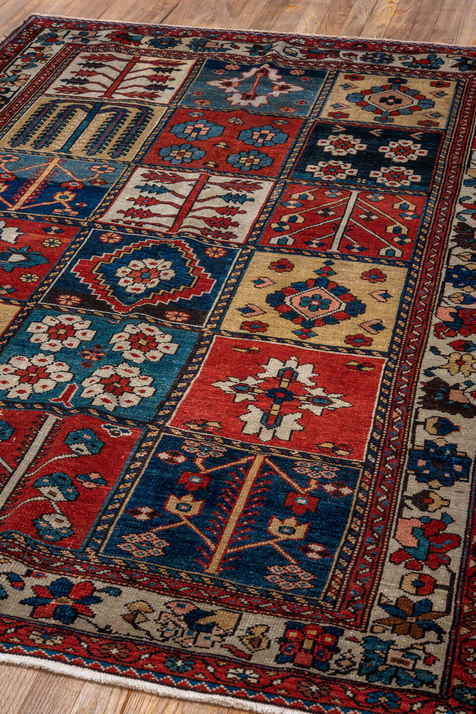 4' x 6' one-of-a-kind handmade vintage Baktiary small size rug. Color palette: black, blue, brown, dark slate gray, gray