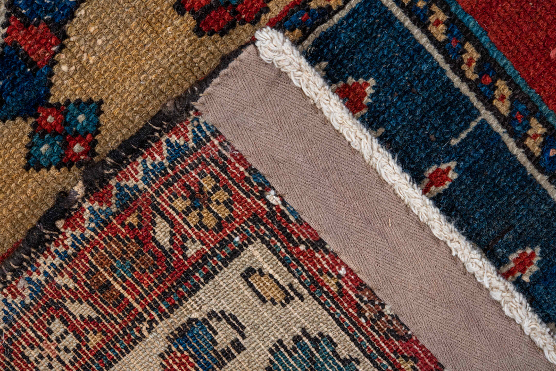 4' x 6' one-of-a-kind handmade antique Baktiary small size rug. Color palette: ivory, red, navy, sky_blue, rust, charcoal