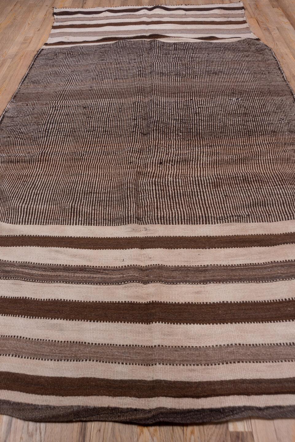 5' x 11' one-of-a-kind handmade vintage Kilim runner rug. Color palette: brown, gray, light gray, off-white, pink