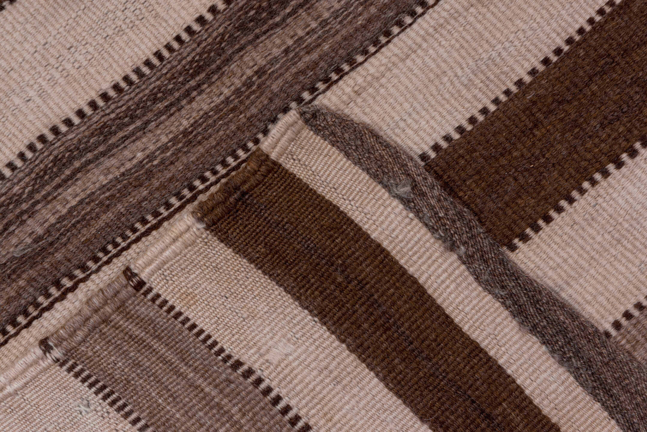 5' x 11' one-of-a-kind handmade vintage Kilim runner rug. Color palette: brown, gray, light gray, off-white, pink