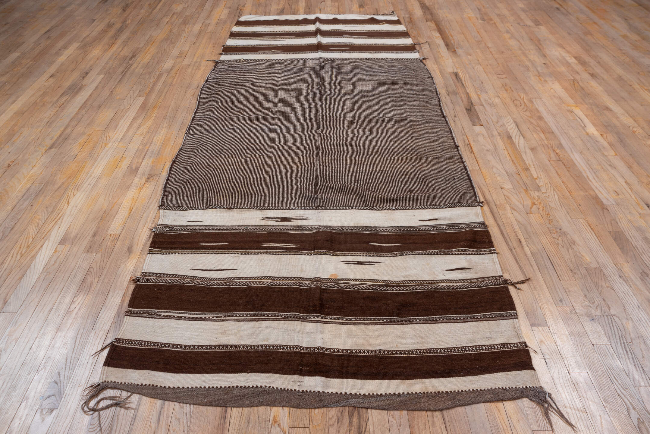 4' x 11' one-of-a-kind handmade vintage Kilim runner rug. Color palette: taupe, brown, ivory, charcoal, beige, gray, black