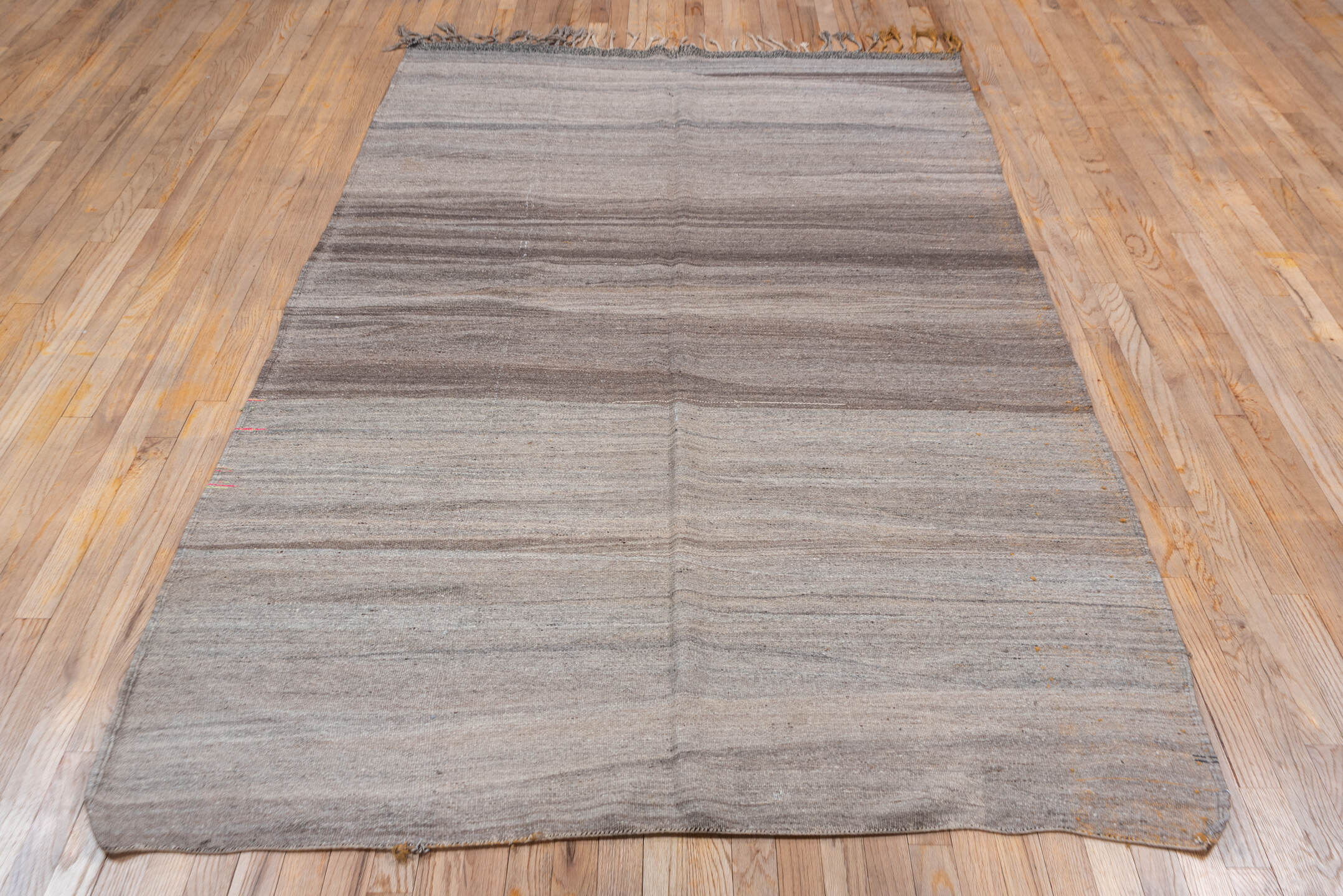 5' x 8' one-of-a-kind handmade vintage Kilim medium size rug. Color palette: taupe, brown, gray, charcoal, ivory, beige