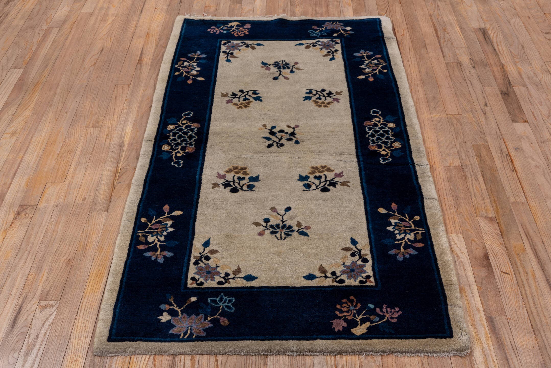 12' x 15' one-of-a-kind handmade vintage Afghan oversize rug. Color palette: ivory, navy, camel, rose, sky blue, taupe