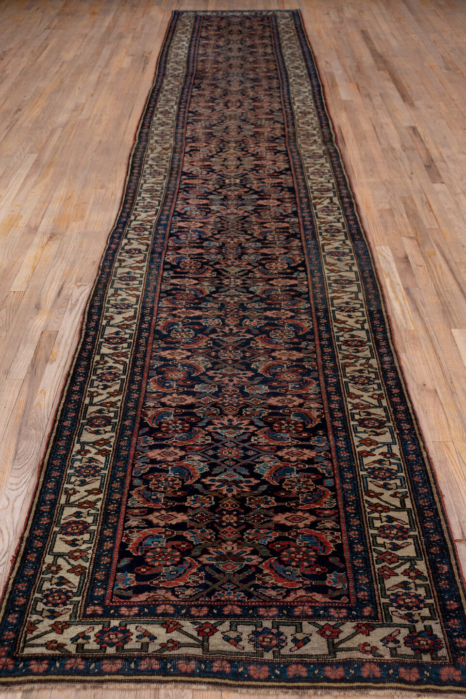 3' x 18' one-of-a-kind handmade vintage Bidjar runner rug. Color palette: black, blue, brown, charcoal, gray, off-white