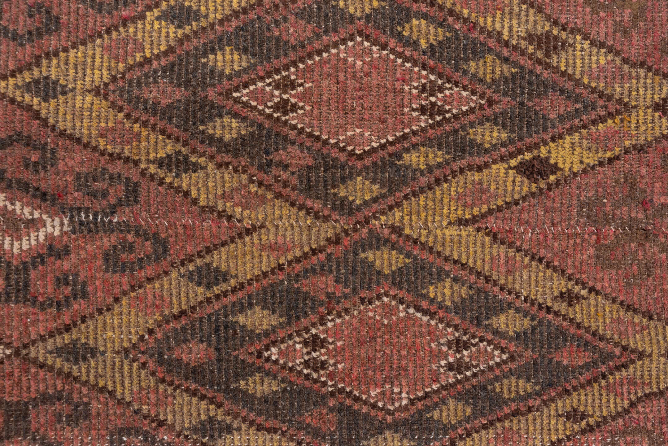 4' x 12' one-of-a-kind handmade vintage Ouzbek runner rug. Color palette: brown, pink, redwood