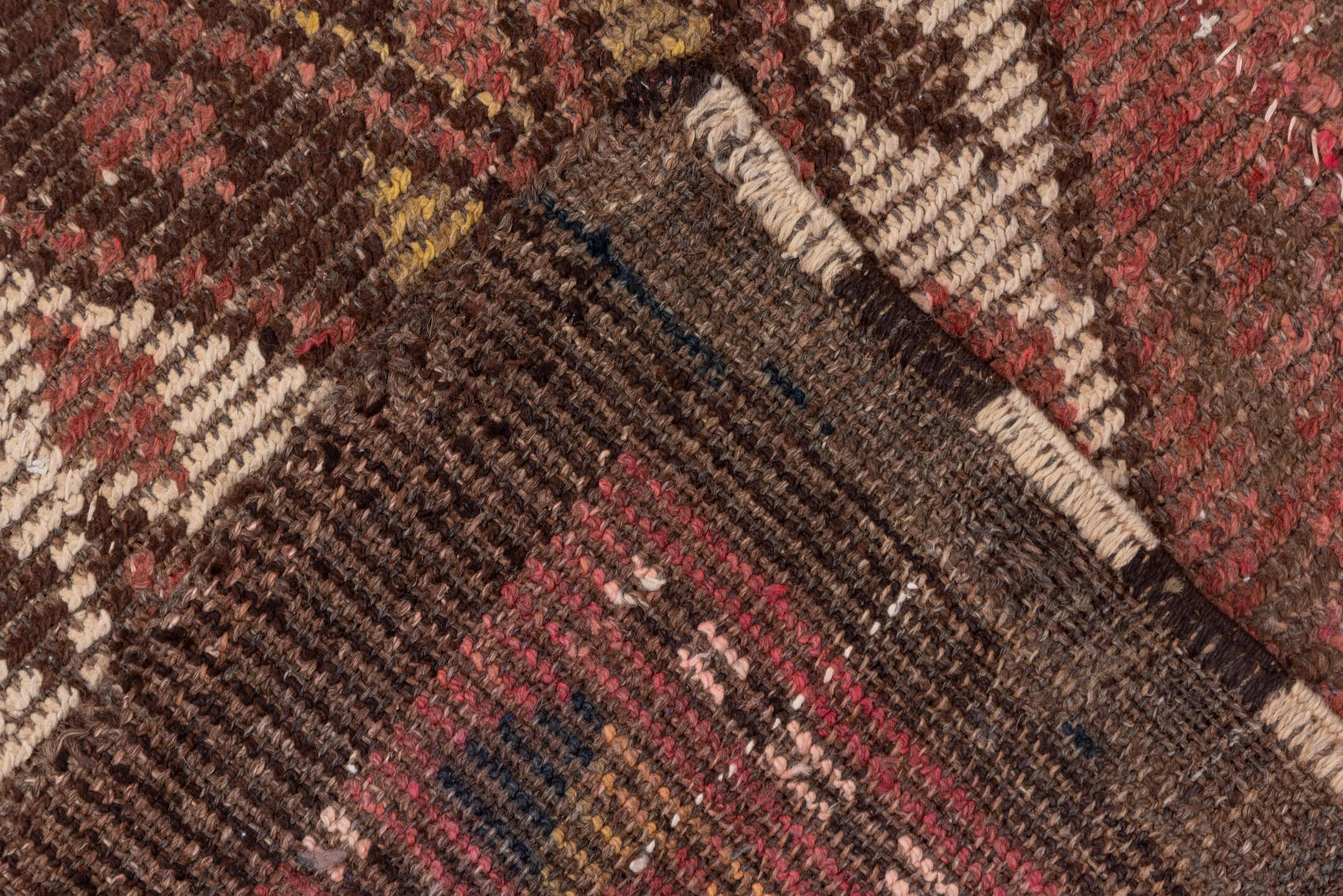 4' x 12' one-of-a-kind handmade antique Ouzbek runner rug. Color palette: rose, brown, ivory, ochre, mahogany, taupe, pink