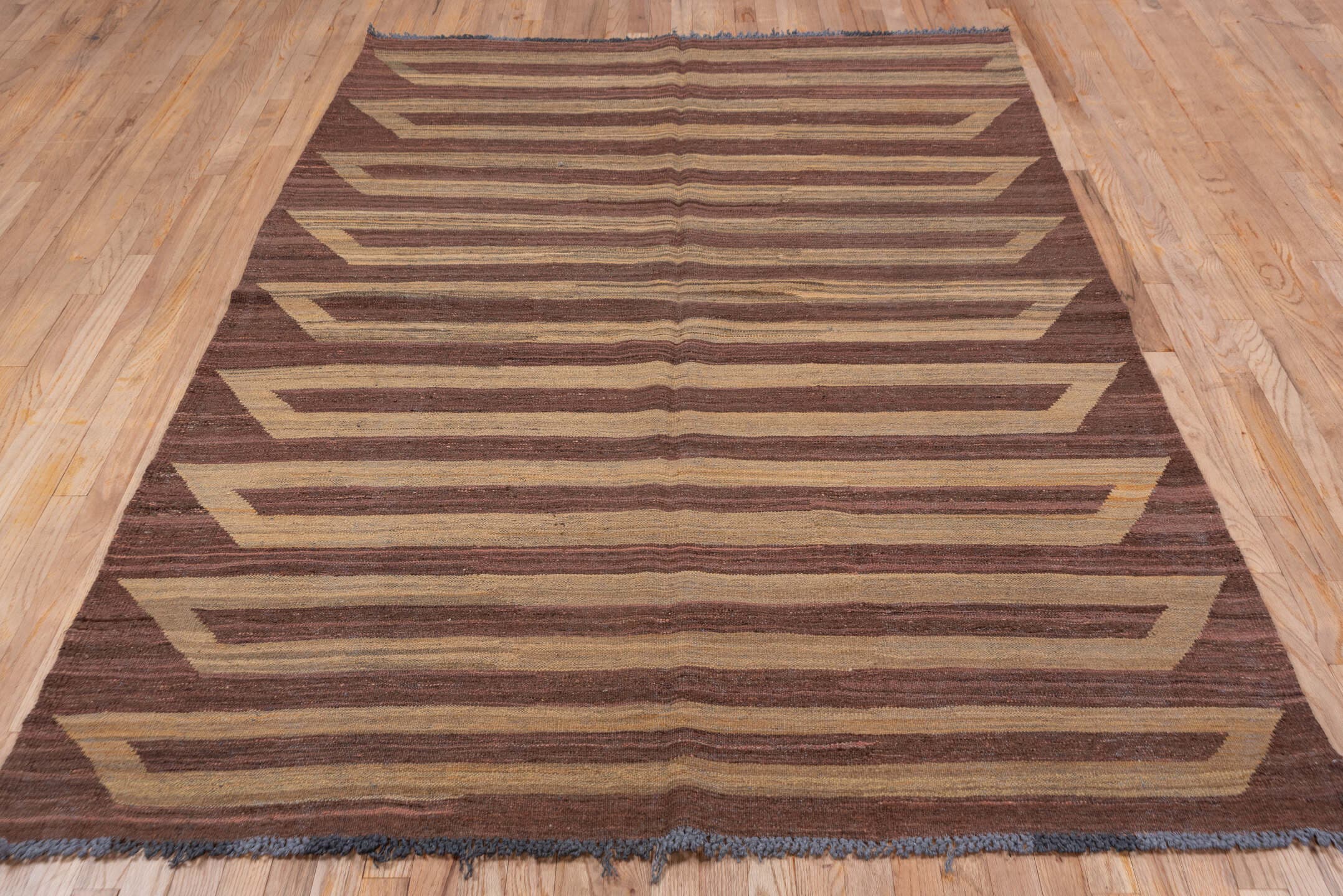 5' x 8' one-of-a-kind handmade vintage Kilim medium size rug. Color palette: brown, camel, taupe, mahogany, charcoal, beige