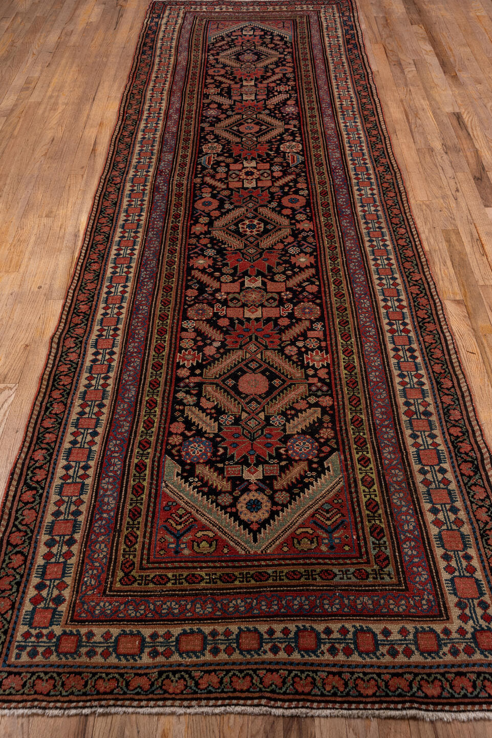 3' x 12' one-of-a-kind handmade antique Malayer runner rug. Color palette: navy, rust, ivory, rose, terracotta, slate, camel