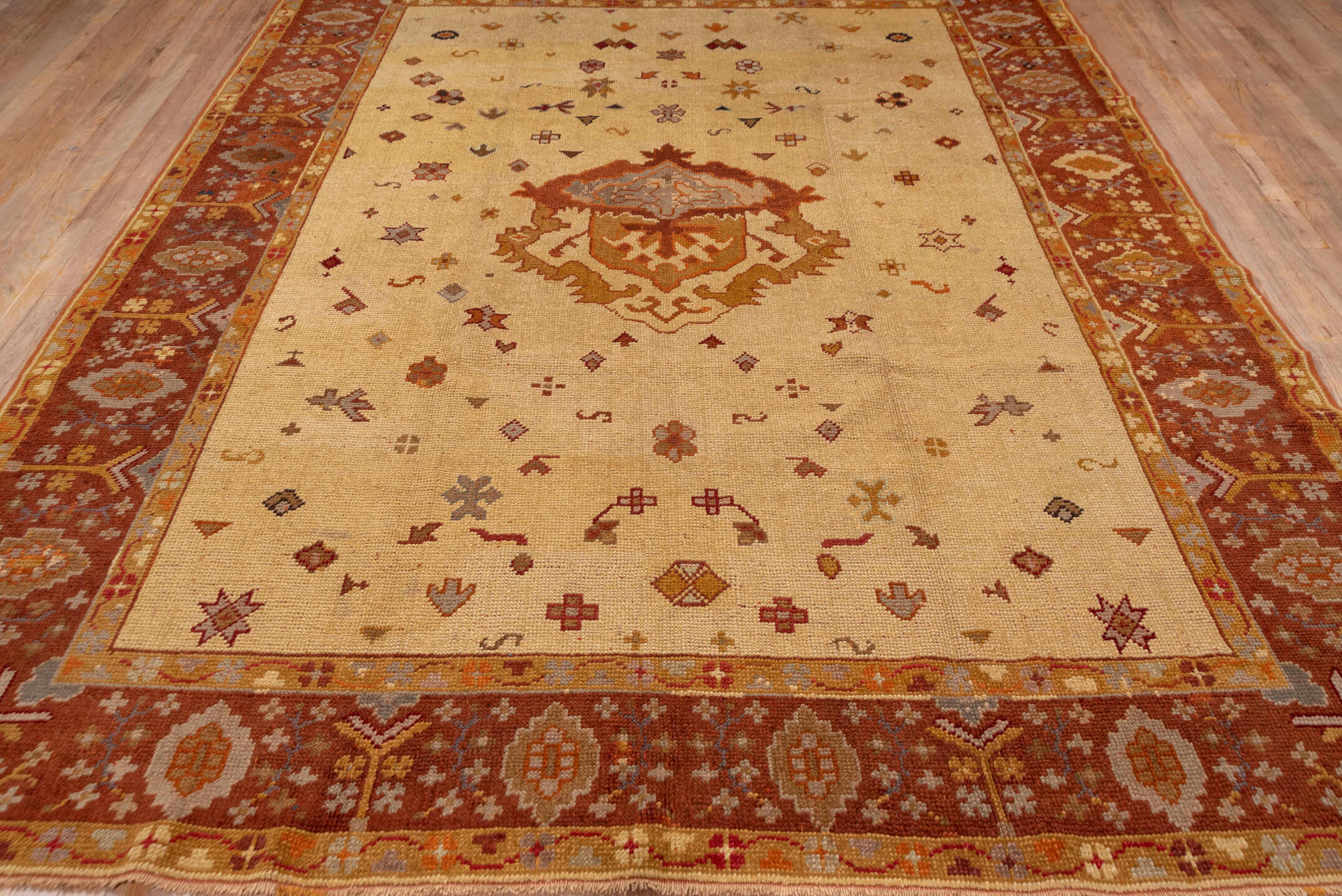 8' x 10' one-of-a-kind handmade antique Oushak large size rug. Color palette: ivory, rust, terra cotta, gold, taupe