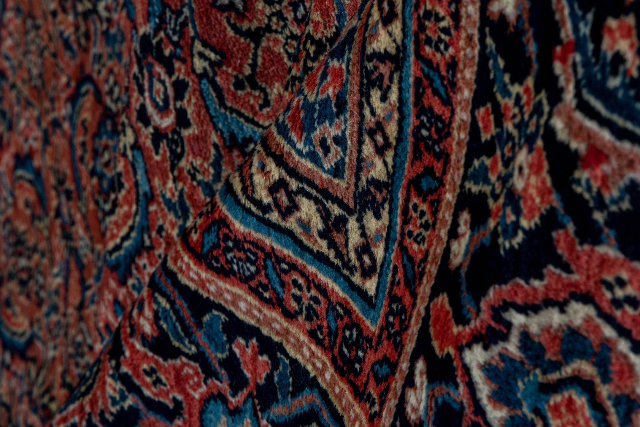 7' x 16' one-of-a-kind handmade antique Karabagh rug. Color palette: rose, navy, terracotta, dusty blue, ivory, rust, slate