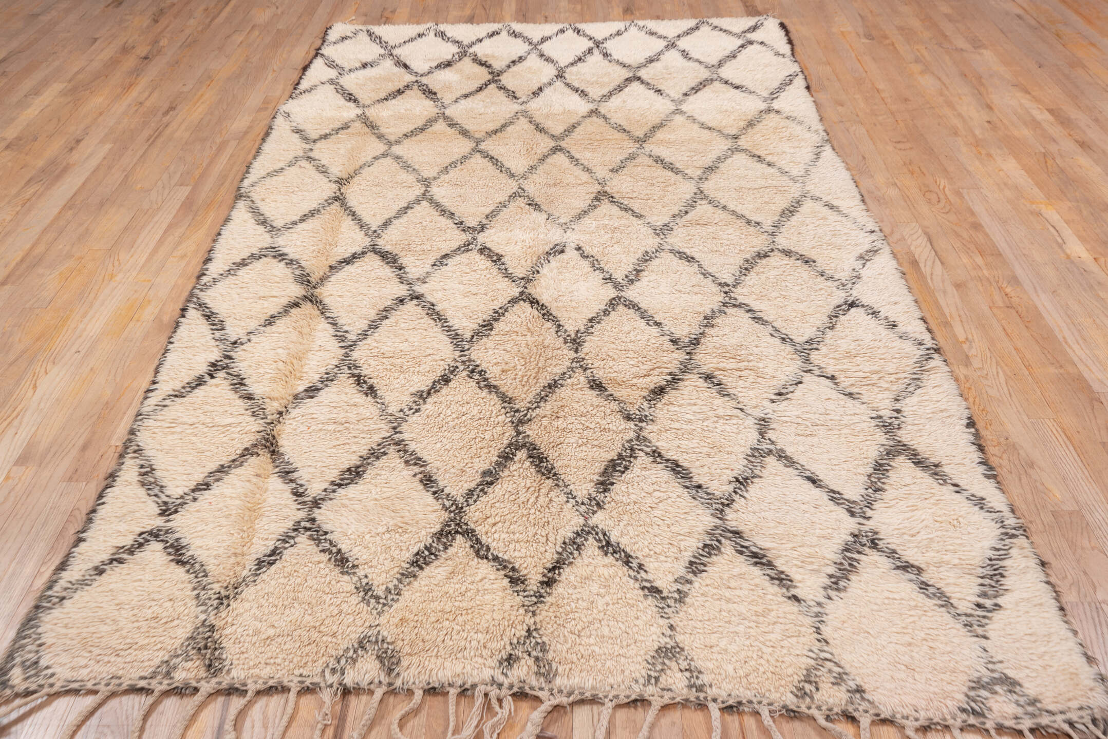 6' x 11' one-of-a-kind handmade antique Moroccan large size rug. Color palette: ivory, charcoal, cream, taupe, gray, black
