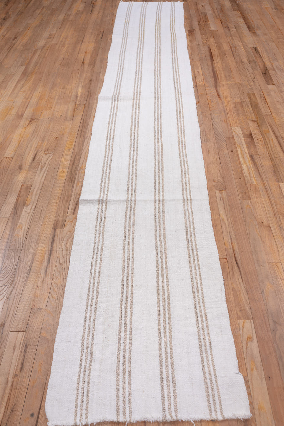 2' x 14' one-of-a-kind handmade vintage Flatweave runner rug. Color palette: ivory, tan, beige