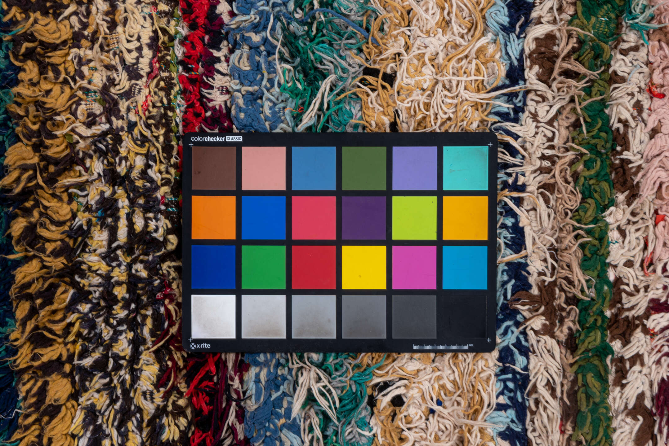 4' x 10' one-of-a-kind handmade vintage Rag Rug runner rug. Color palette: blue, brown, fiord, gray, green, light gray