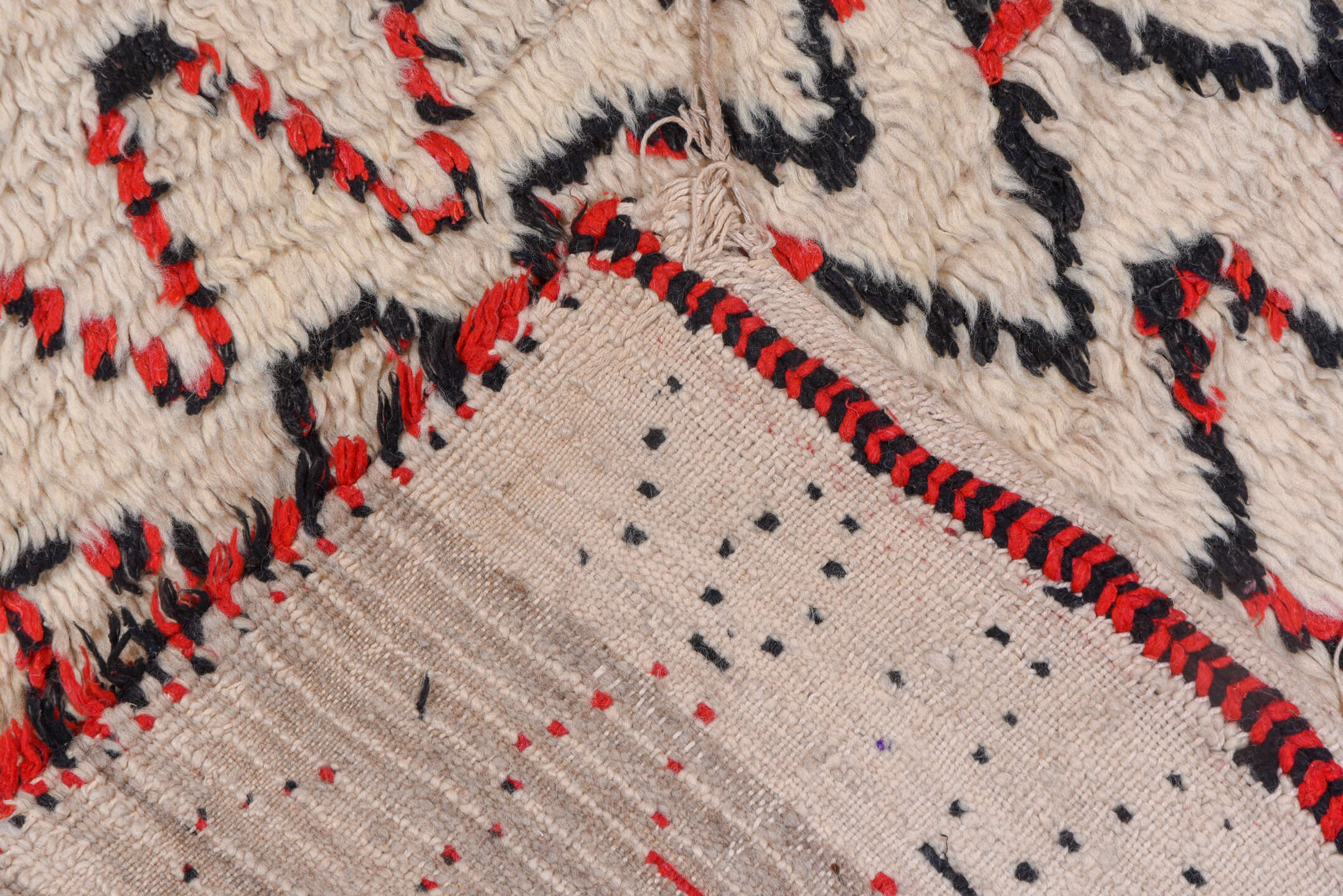 5' x 11' one-of-a-kind handmade vintage Moroccan rug. Color palette: ivory, black, red, coral, gold, blue, green, terracotta