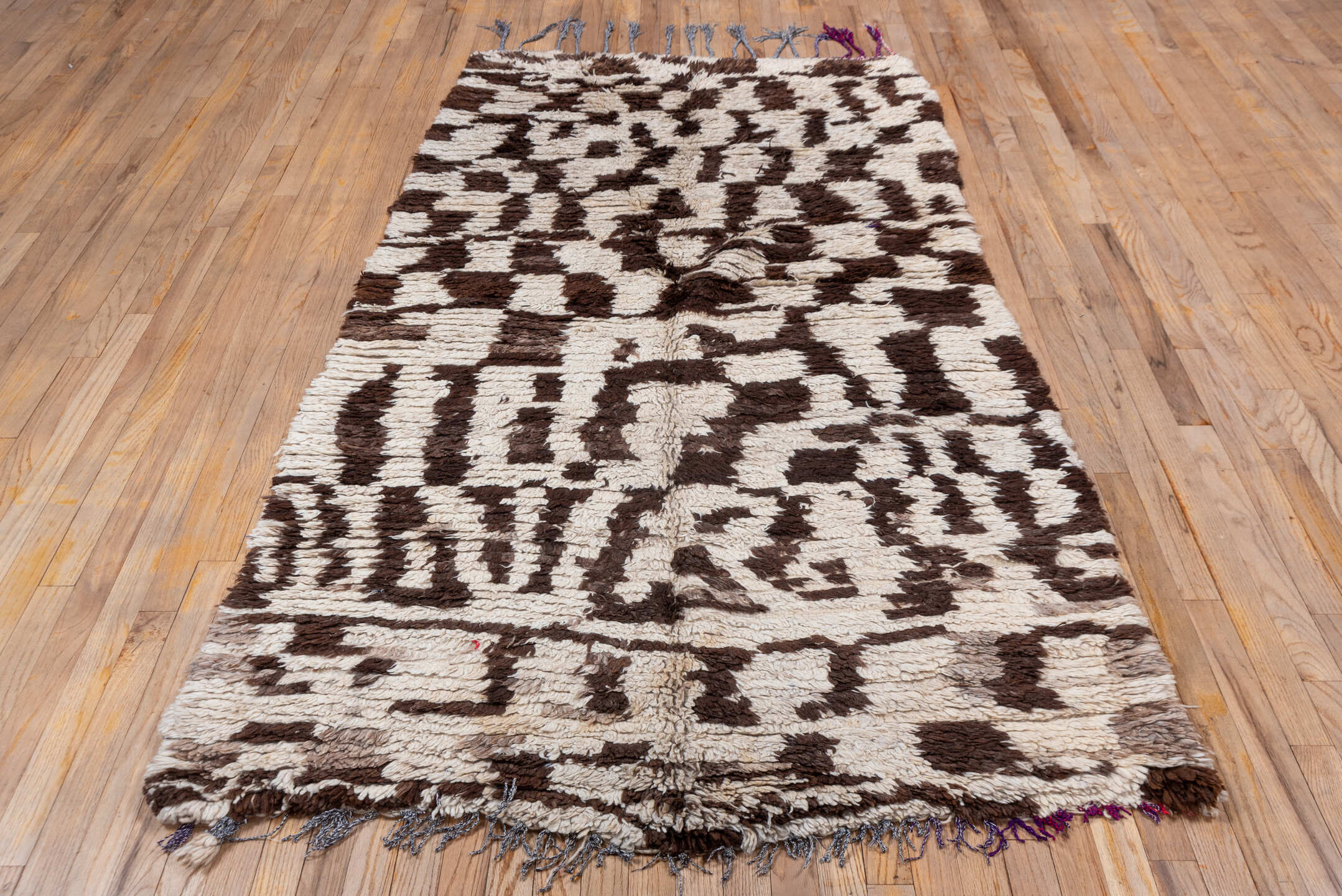 4' x 8' one-of-a-kind handmade vintage Moroccan rug. Color palette: black, brown, gainsboro, gray, light gray, off-white
