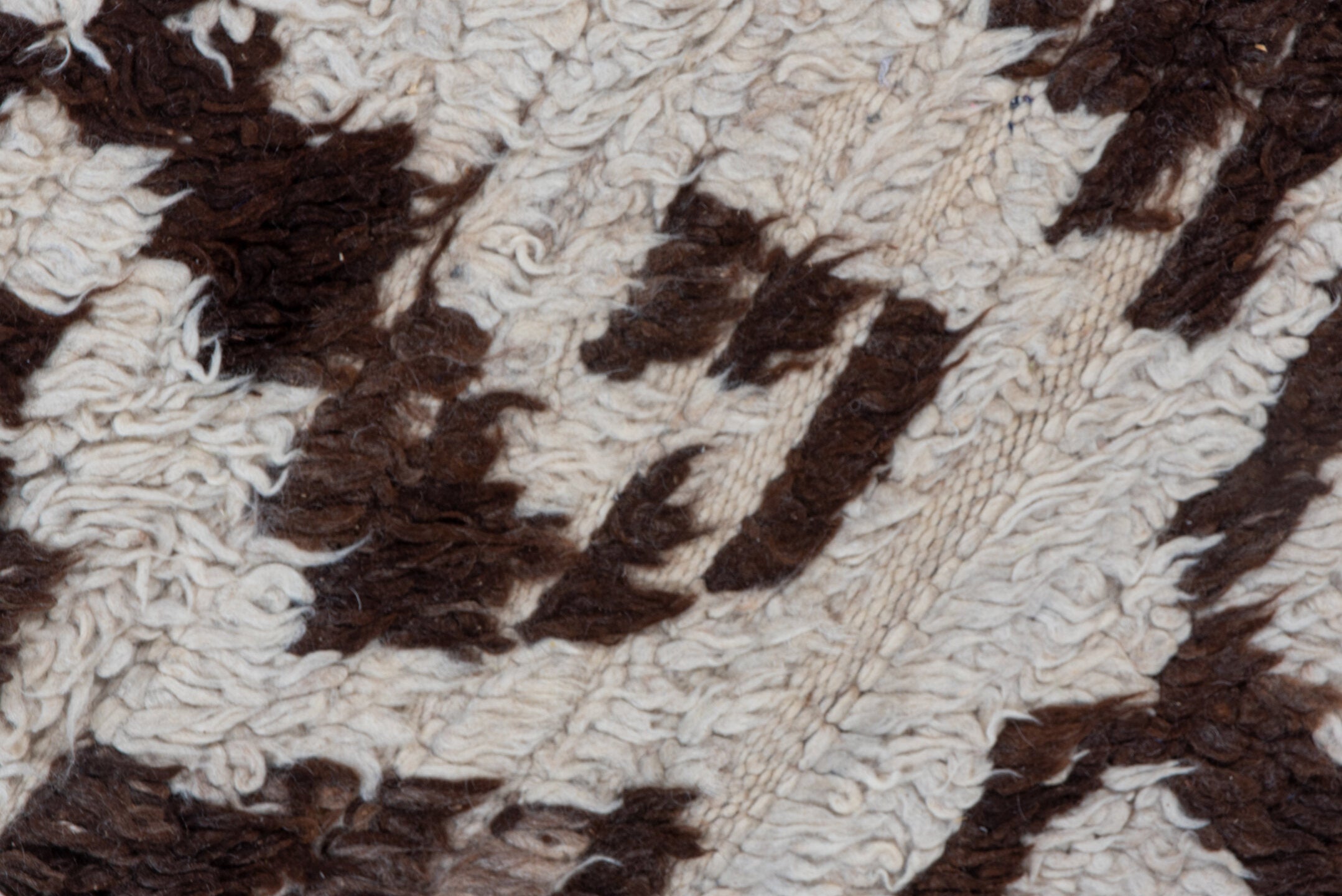 4' x 8' one-of-a-kind handmade vintage Moroccan rug. Color palette: ivory, dark brown, taupe, brown, beige, gray