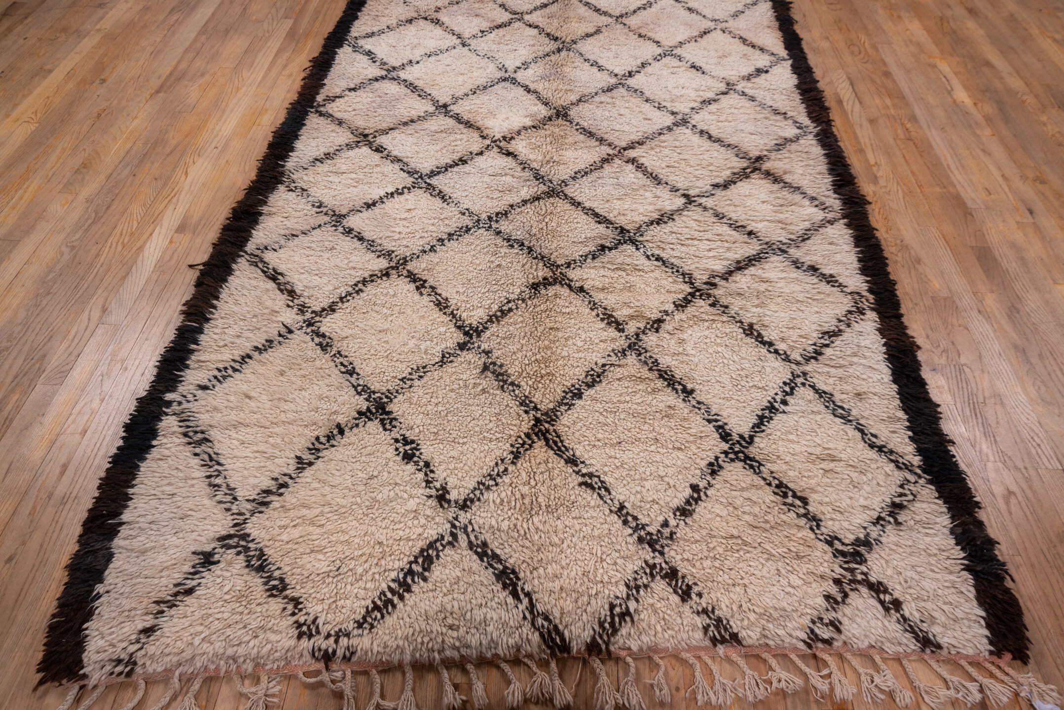 5' x 14' one-of-a-kind handmade vintage Moroccan rug. Color palette: ivory, charcoal, brown, cream, gray, black