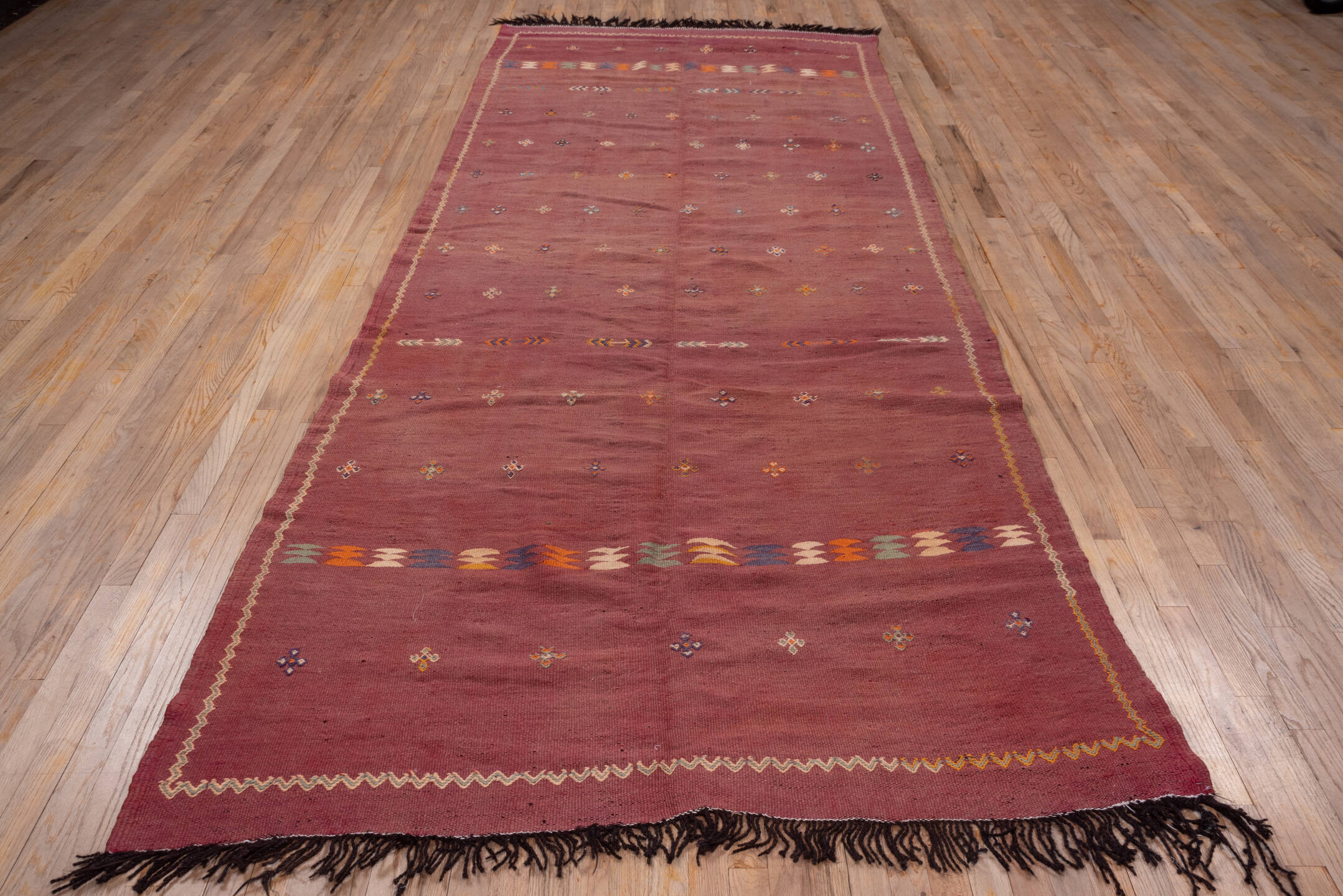 5' x 12' one-of-a-kind handmade vintage Kilim rug. Color palette: brown, gray, light gray, orange, pink, red