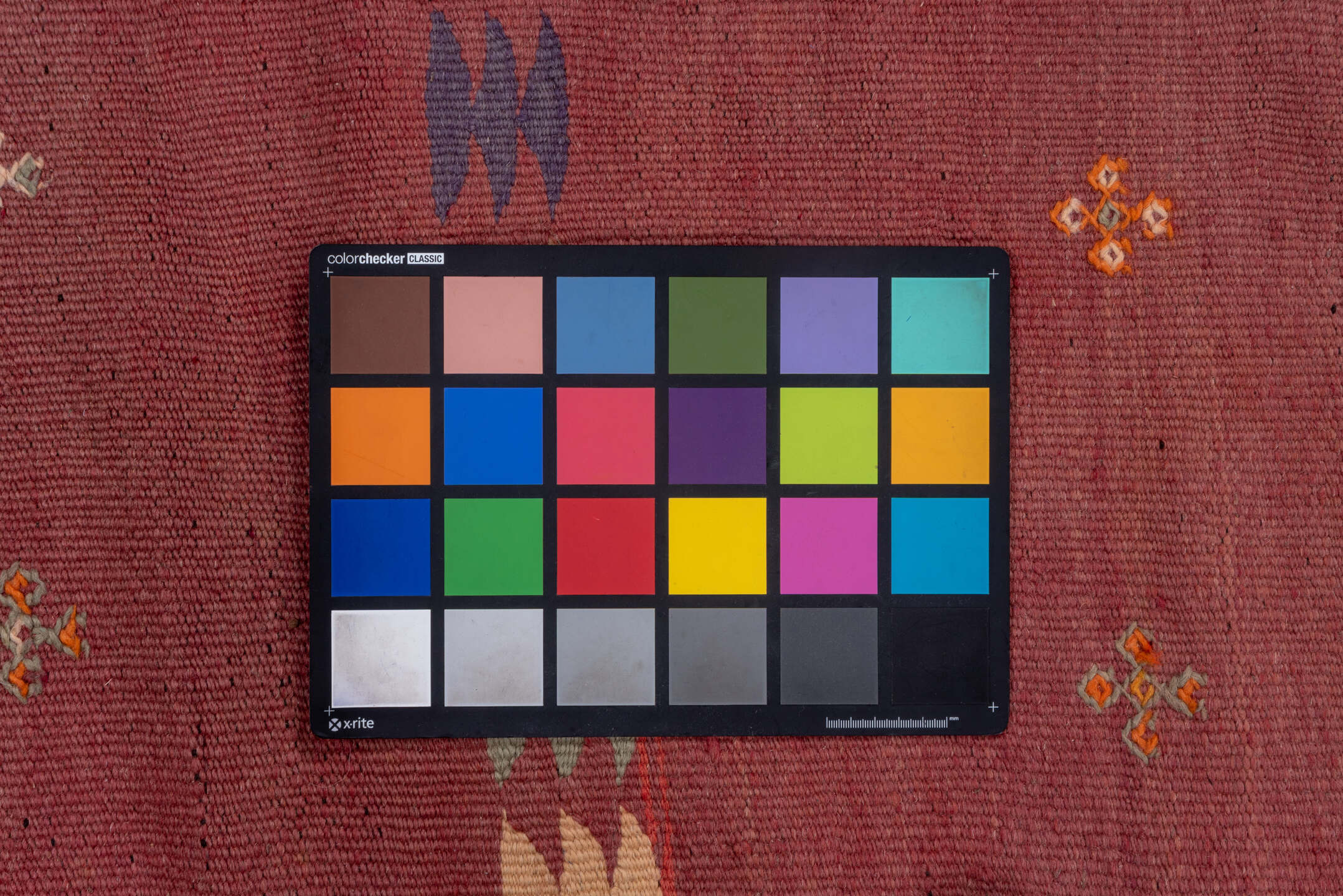 5' x 12' one-of-a-kind handmade vintage Kilim rug. Color palette: brown, gray, light gray, orange, pink, red