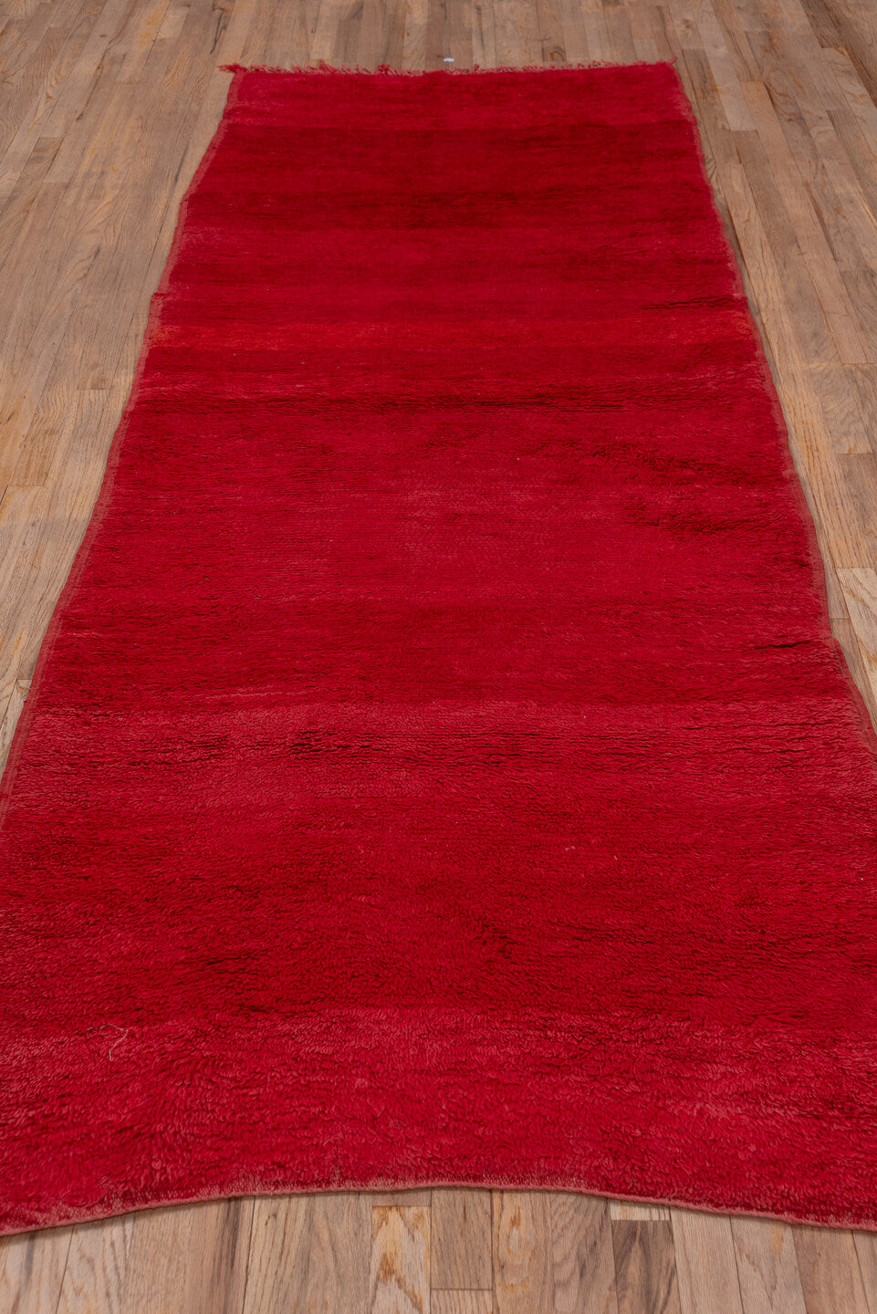 3' x 10' one-of-a-kind handmade vintage Moroccan runner rug. Color palette: crimson, burgundy, ruby, red