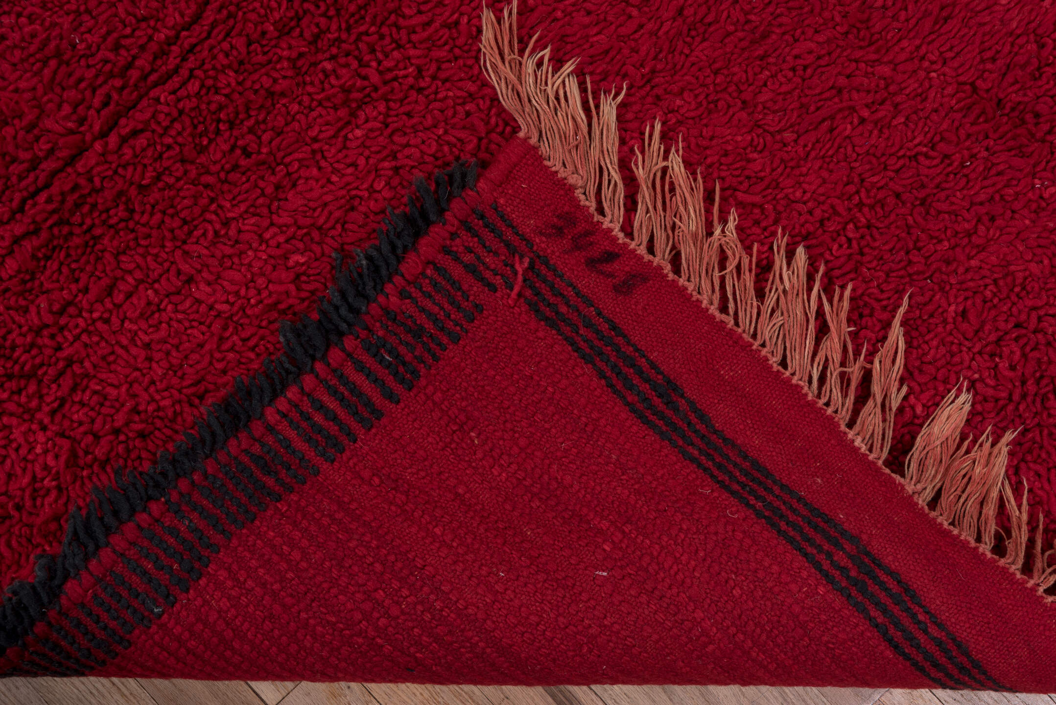 3' x 10' one-of-a-kind handmade vintage Moroccan runner rug. Color palette: black, brown, crimson, gray, off-white, pink