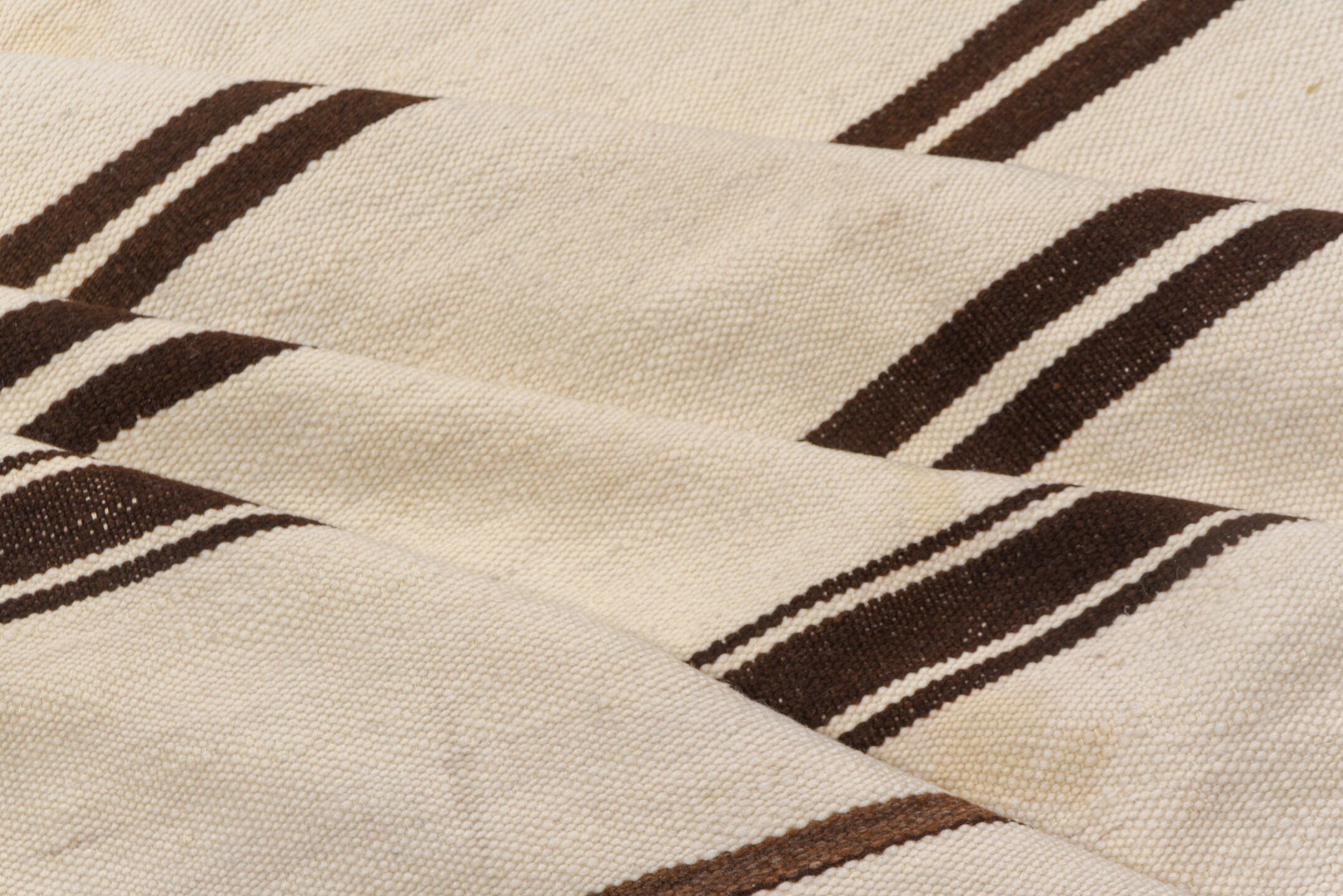 5' x 10' one-of-a-kind handmade vintage Blanket medium size rug. Color palette: ivory, brown, cream, taupe, beige, gray