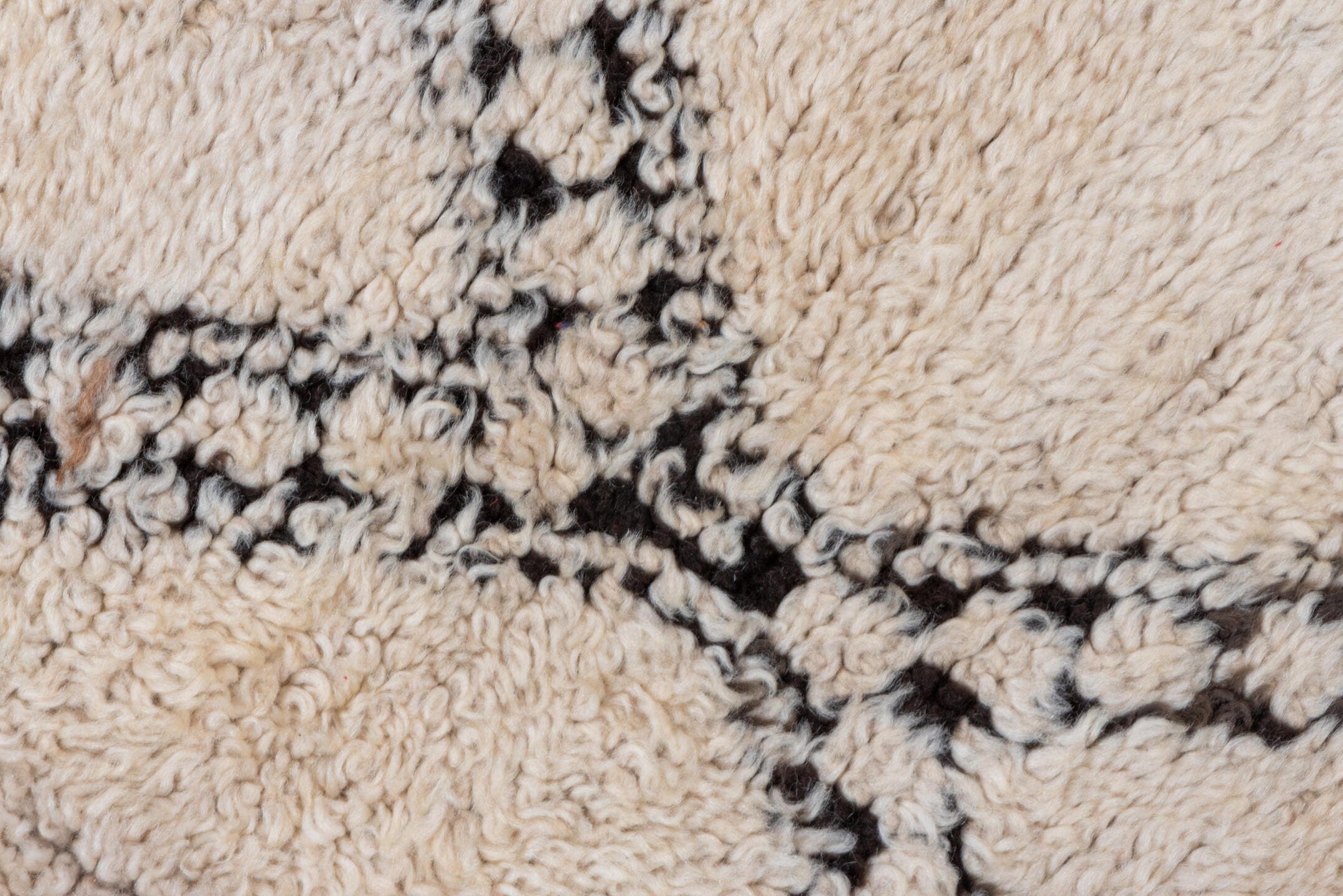 5' x 11' one-of-a-kind handmade vintage Moroccan rug. Color palette: ivory, charcoal, cream, red, gray, black