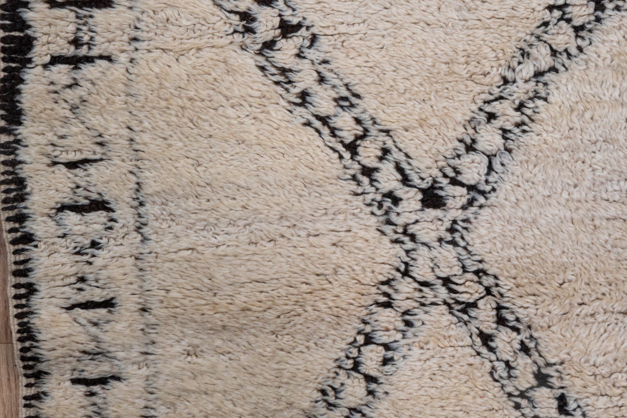 5' x 11' one-of-a-kind handmade vintage Moroccan rug. Color palette: ivory, charcoal, cream, red, gray, black
