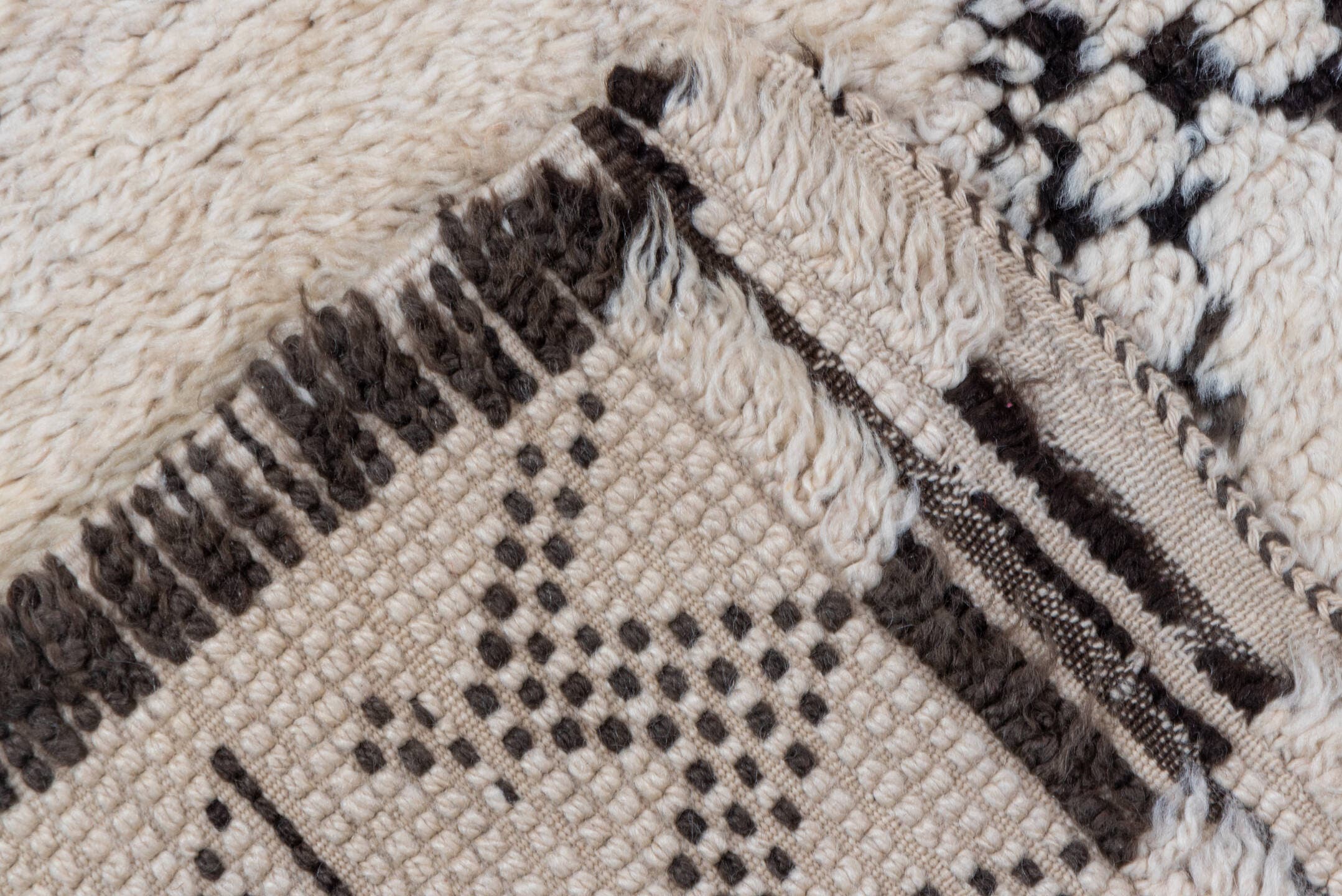 5' x 11' one-of-a-kind handmade vintage Moroccan rug. Color palette: ivory, charcoal, cream, red, gray, black
