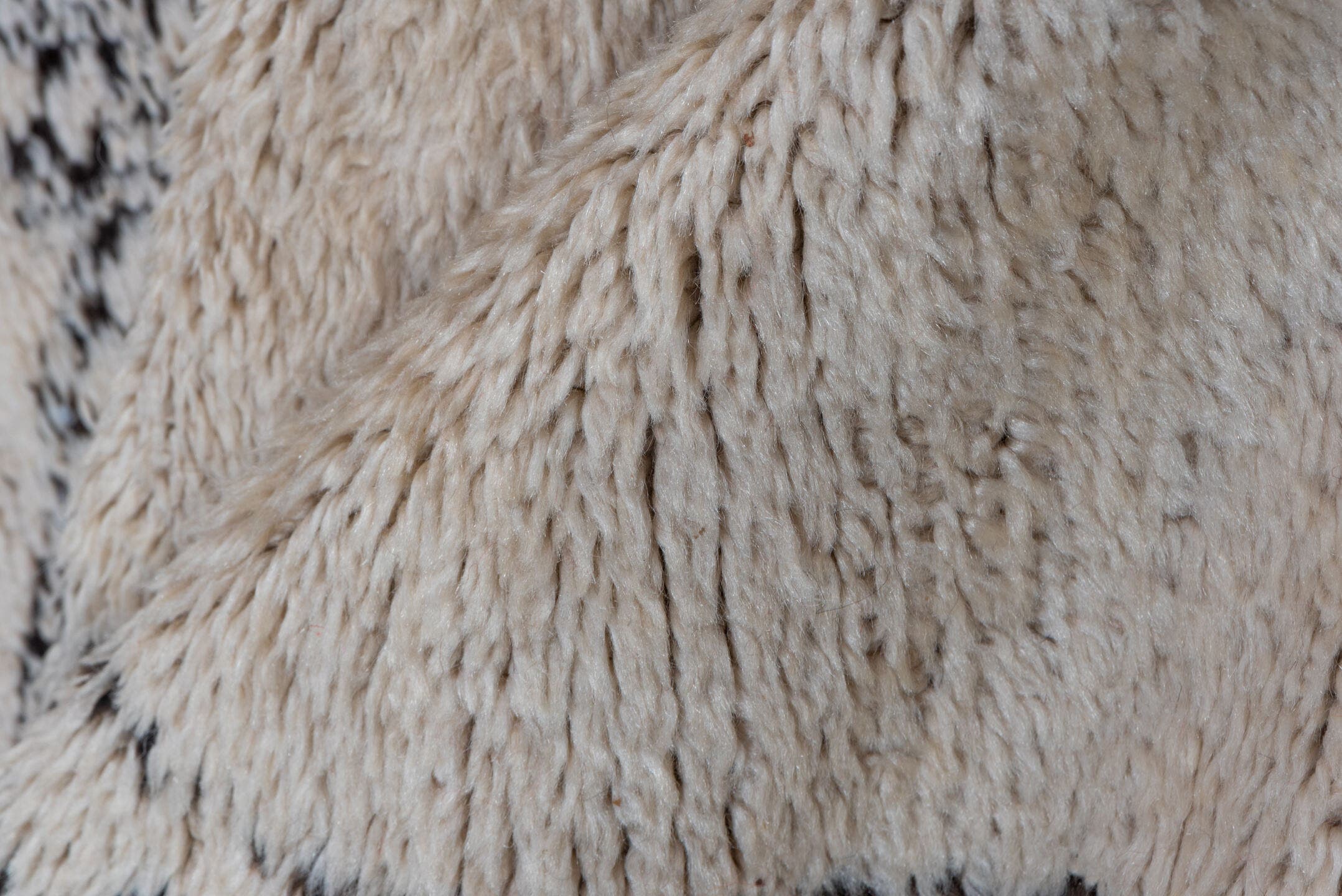 5' x 11' one-of-a-kind handmade vintage Moroccan rug. Color palette: ivory, charcoal, cream, red, gray, black