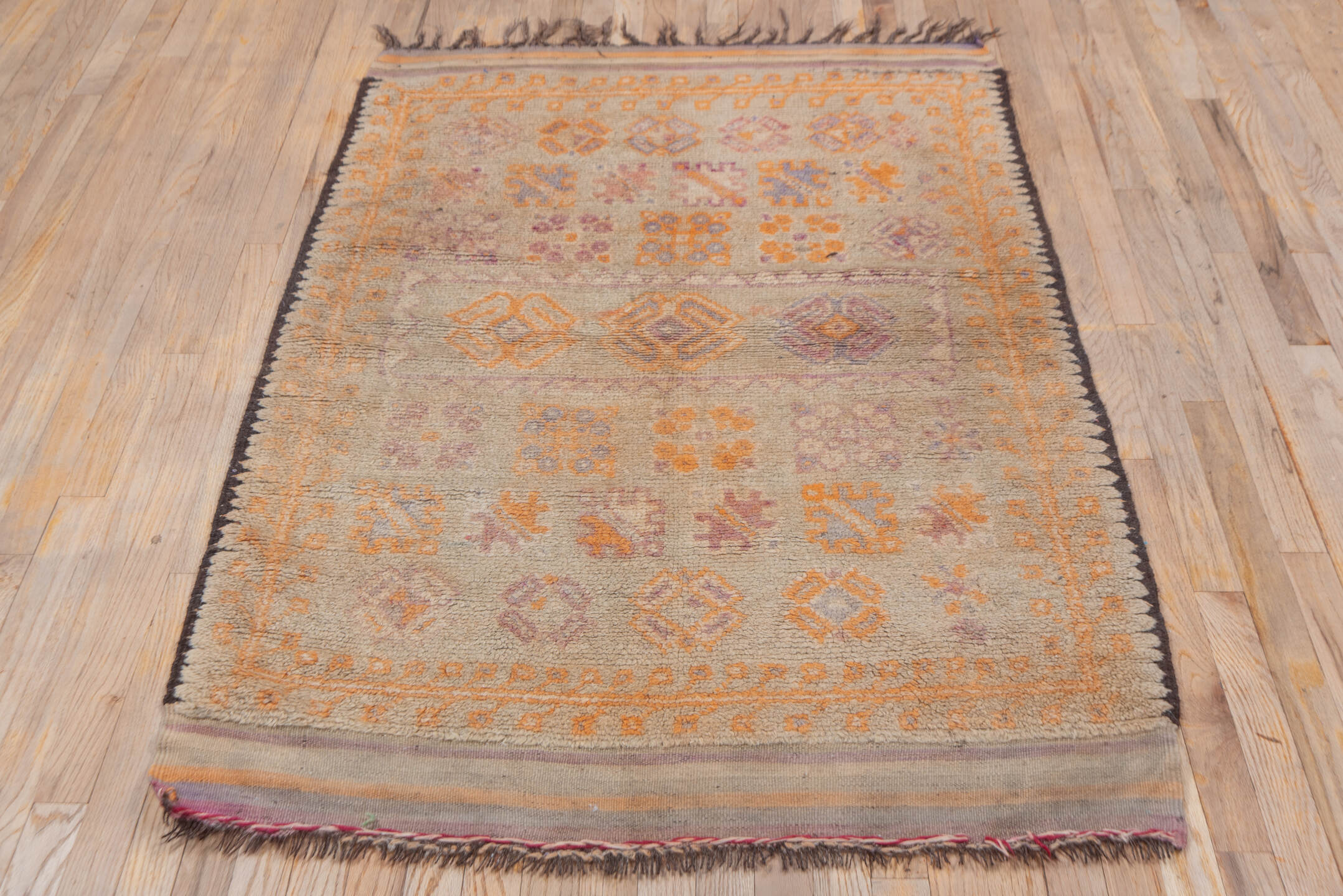 3' x 5' one-of-a-kind handmade vintage Moroccan small size rug. Color palette: ivory, saffron, taupe, rose, lavender, brown